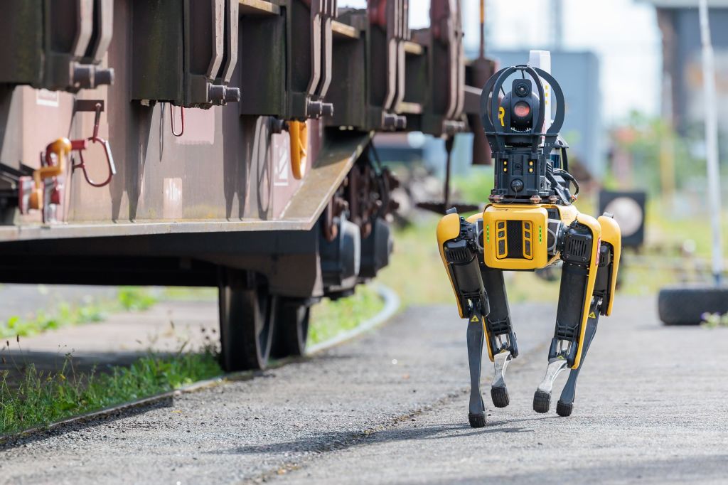 Robot dog for digital maintenance of freight cars