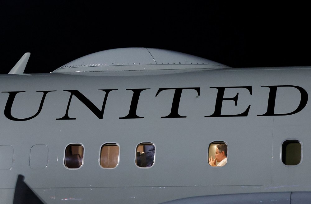 Blinken sits inside a plane after landing in Istanbul, Turkey, on Jan. 5, 2024.