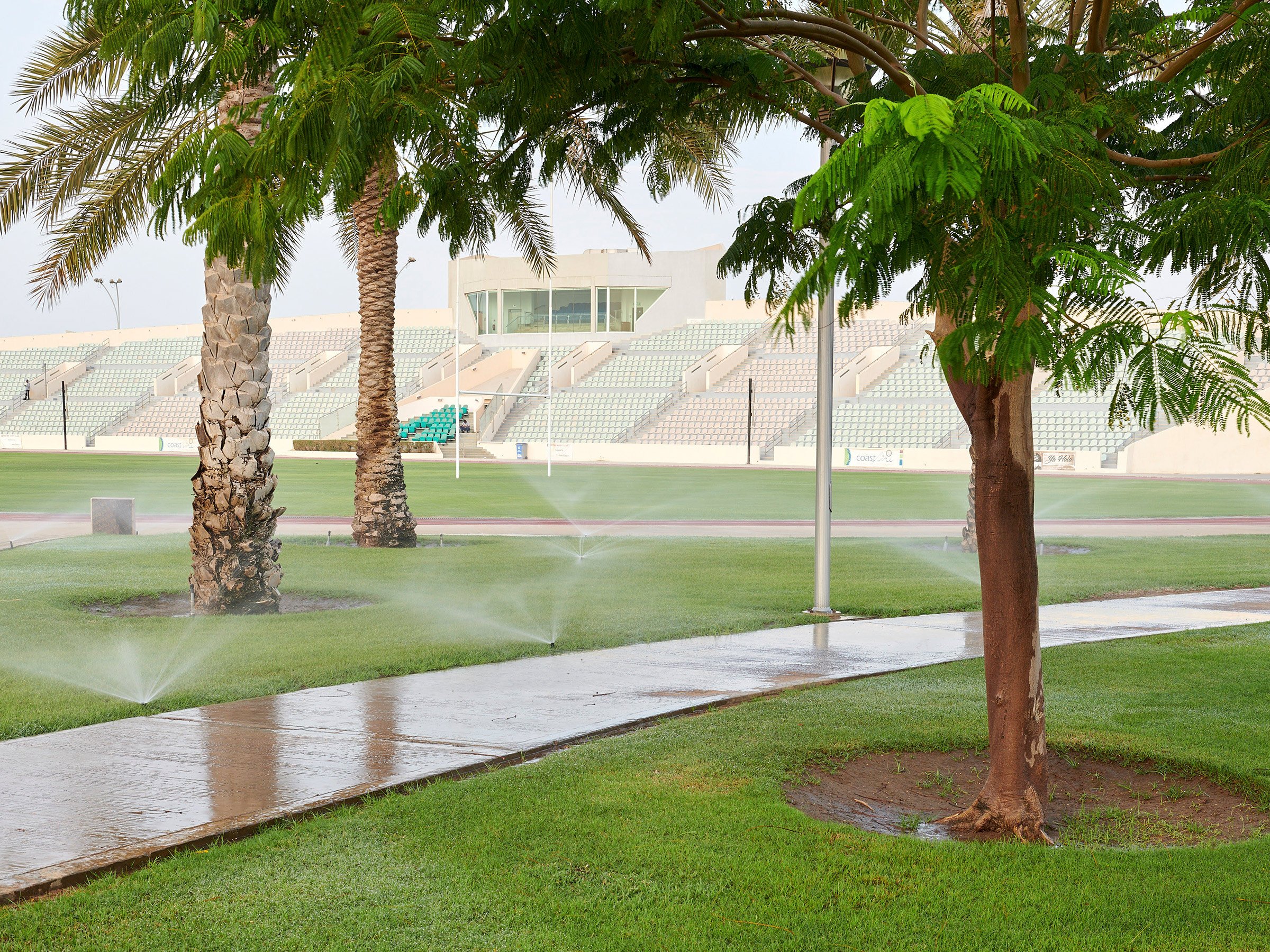 Sprinklers release desalinated water on a grassy area at the athletic stadium at King Abdullah University of Science and Technology in Thuwal, Saudi Arabia, Oct. 2019.