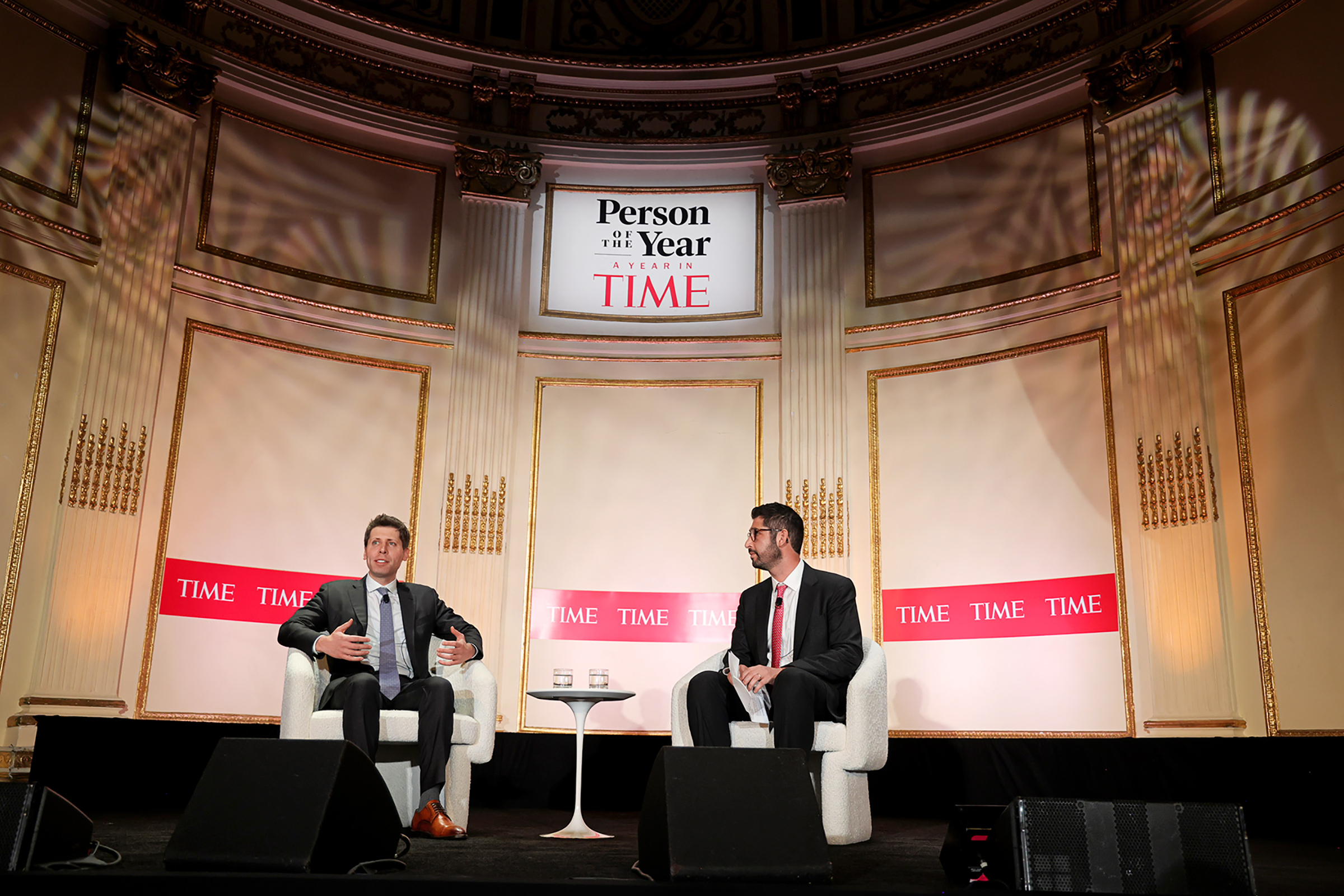 OpenAI’s Sam Altman, left, speaks to TIME’s editor-in-chief Sam Jacobs in New York City on Dec. 12 (Kevin Mazur—Getty Images for TIME)