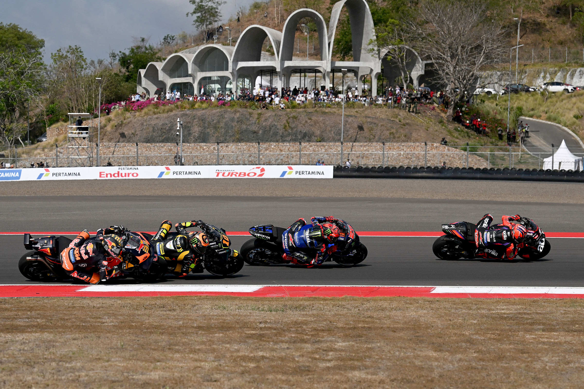 Riders compete in the Indonesian Grand Prix MotoGP at the Mandalika International Circuit in Lombok, Indonesia, on Oct. 15, 2023.