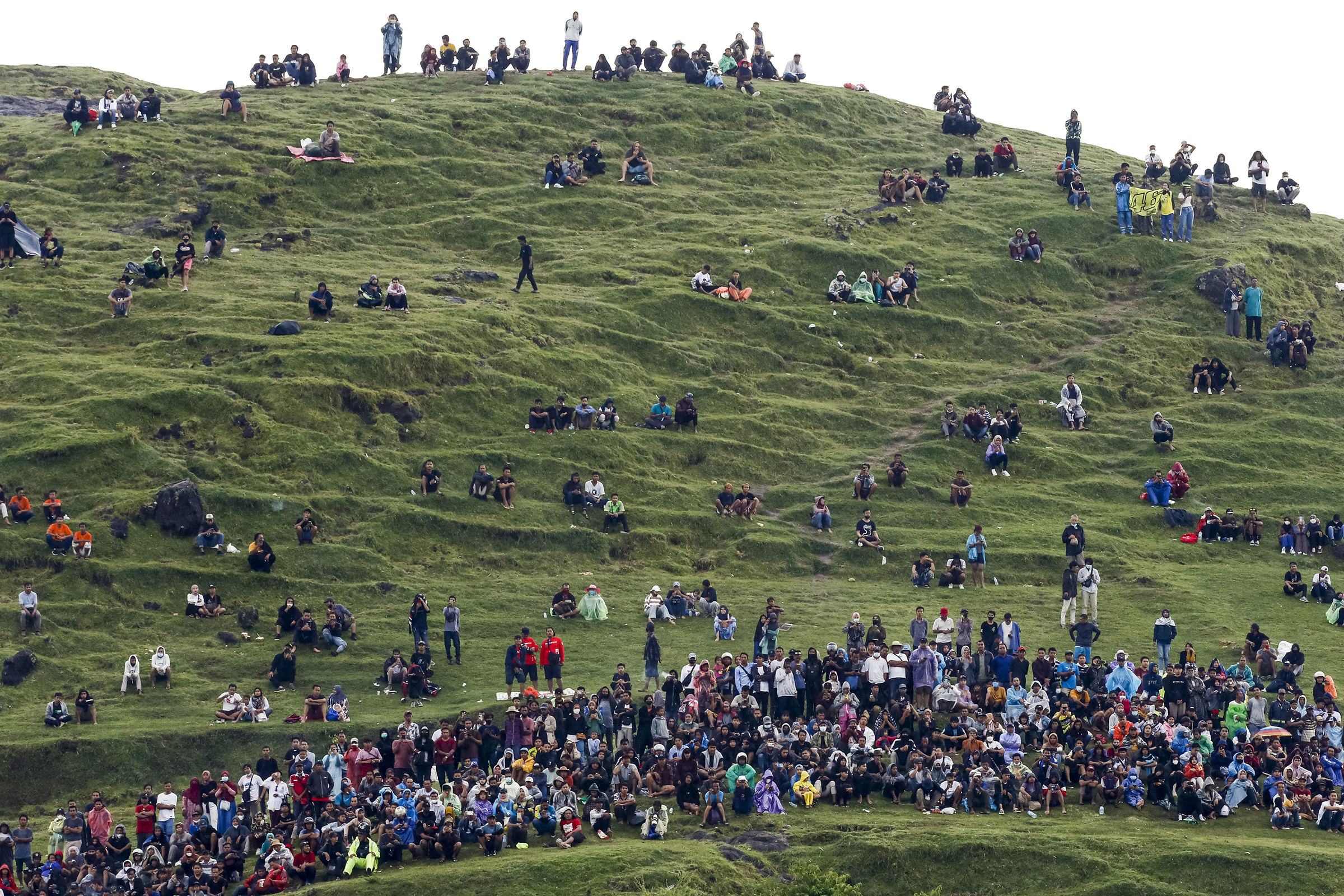 Spectators seen on the hill nearby during the race of MotoGP Pertamina Grand Prix of Indonesia at Mandalika International Street Circuit, Lombok, Indonesia on March 20, 2022.