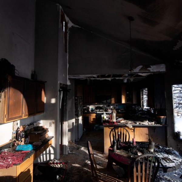 Sunlight illuminates the walls of a residence destroyed by the Marshall Fire in the Rock Creek neighborhood of Superior in Boulder County, Colorado on January 1, 2022.