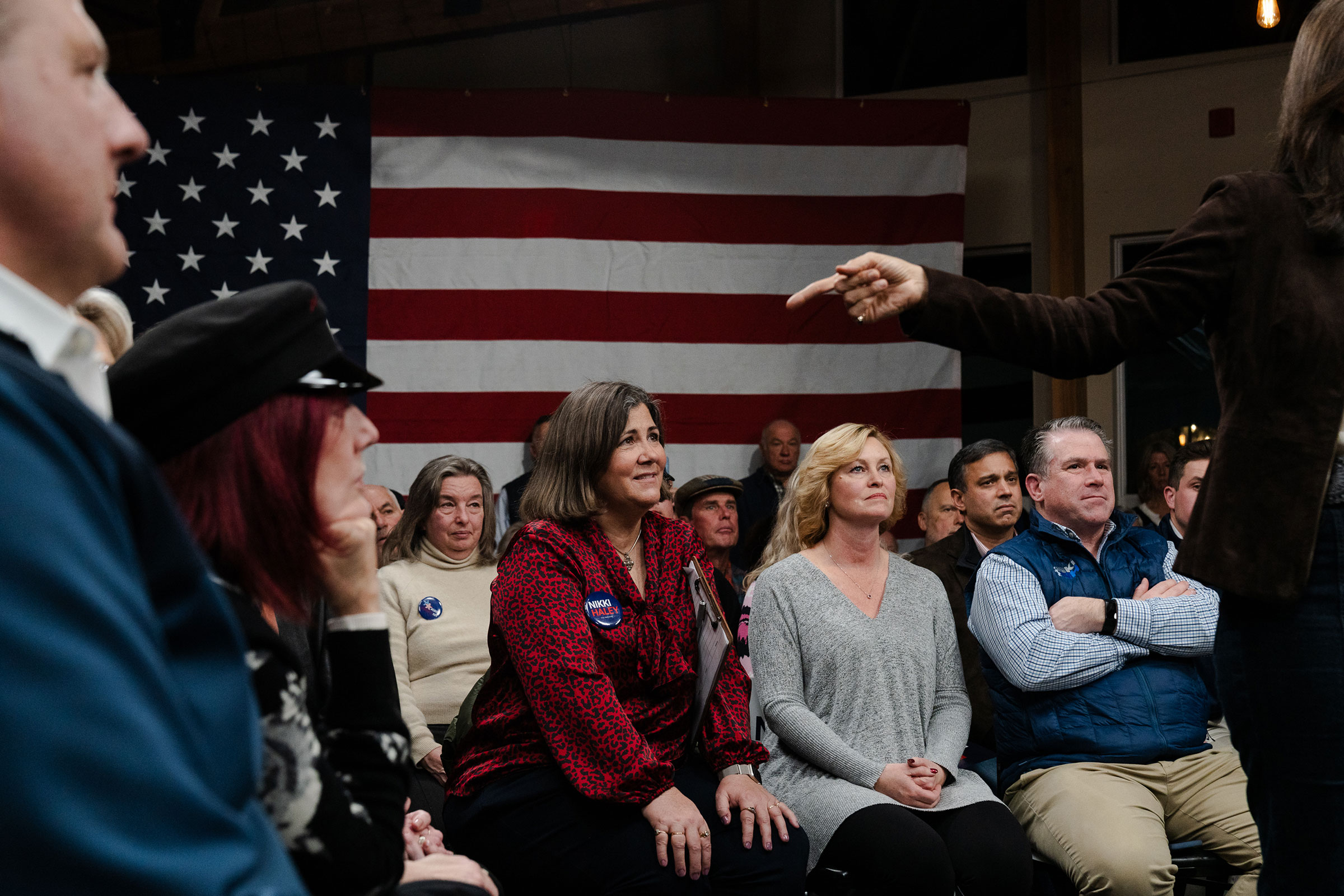 People listen to Haley speak after receiving the endorsement of New Hampshire Gov. Chris Sununu during a Town hall event at McIntyre Ski Area in Manchester, NH on Dec. 12, 2023.