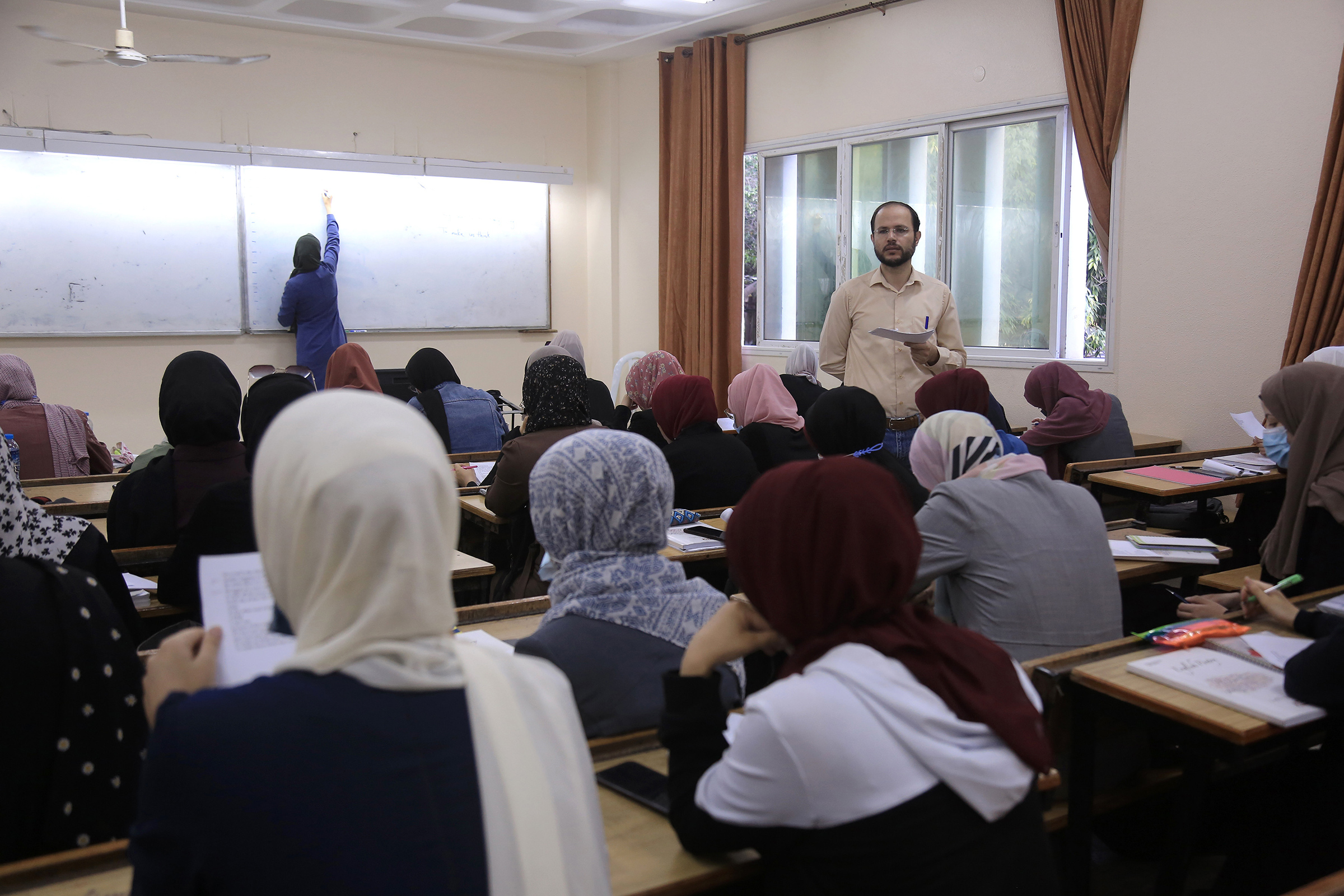 Professor Refaat Alareer during a lecture to his undergraduate literature students at the Islamic University in Gaza on Oct. 4, 2021.