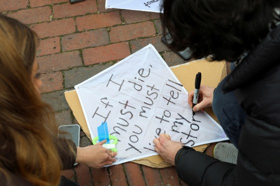 Demonstrators decorate a kite with a quote from Palestinian poet Refaat Alareer at a rally held by the Boston Coalition for Palestine calling for a permanent cease-fire in Gaza, in Boston, Mass., Dec. 17.