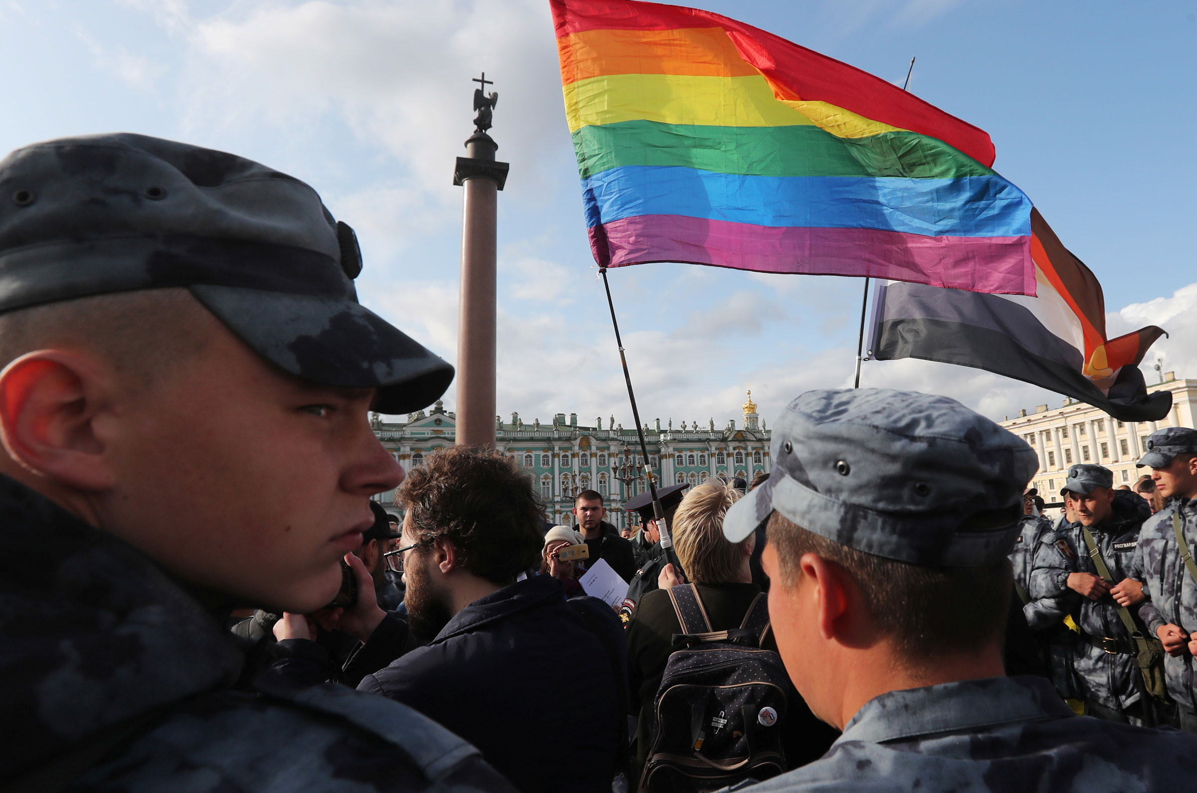 Law enforcement officers block participants of the LGBT community rally in Saint Petersburg