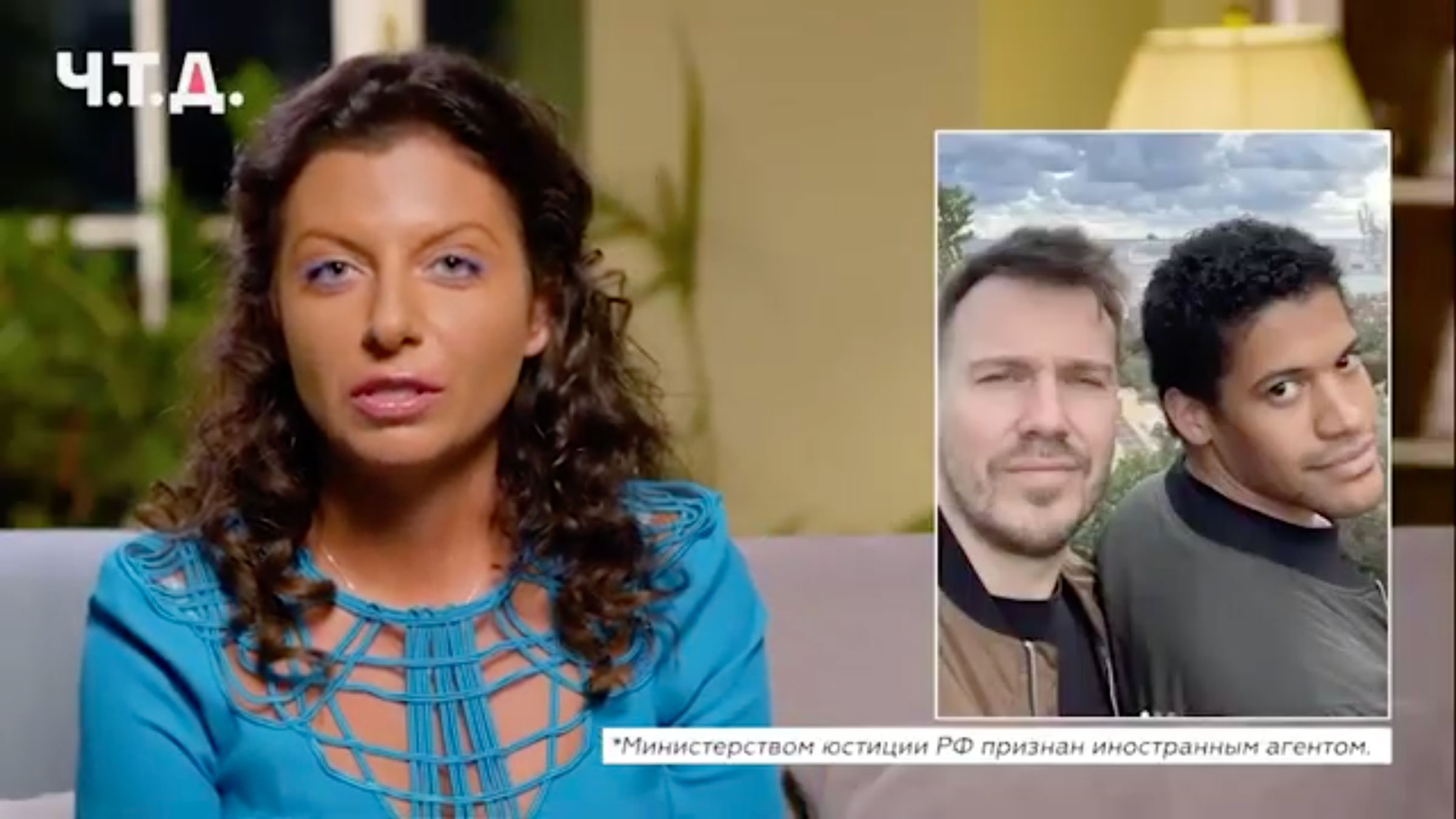 screenshot of RT television segment by Margarita Simonyan about Mikhail Zygar and his husband
