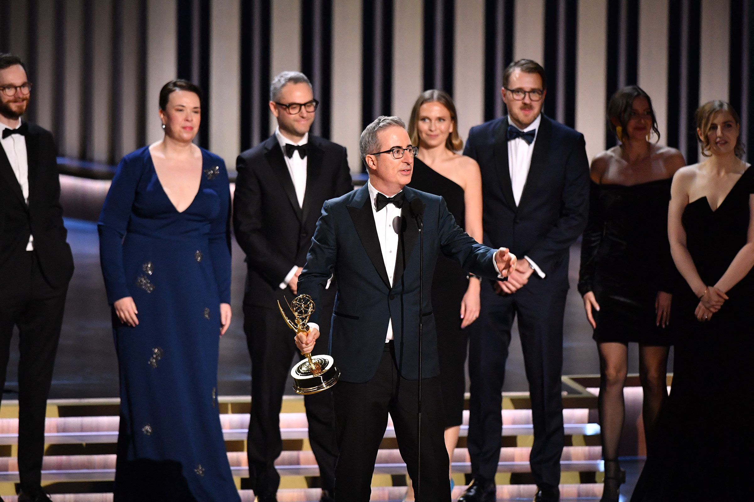 John Oliver, winner of Outstanding Scripted Variety Series with "Last Week Tonight with John Oliver" speaks onstage during the 75th Emmy Awards.