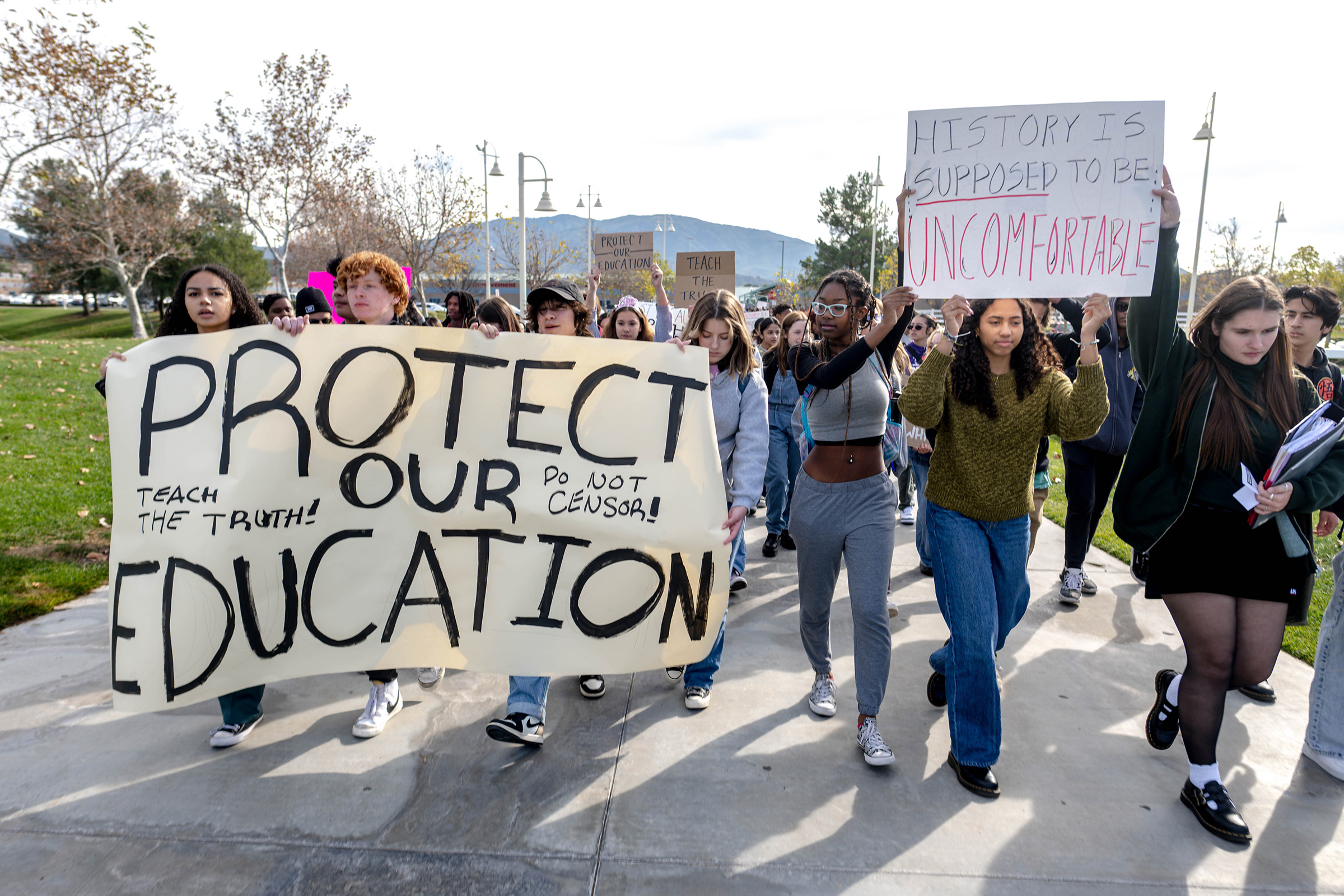 Great Oak High School students leave campus in protest of the districts ban of critical race theory curriculum at Patricia H. Birdsall Sports Park in Temecula on Friday, Dec. 16, 2022. (Watchara Phomicinda—The Press-Enterprise/Getty Images)