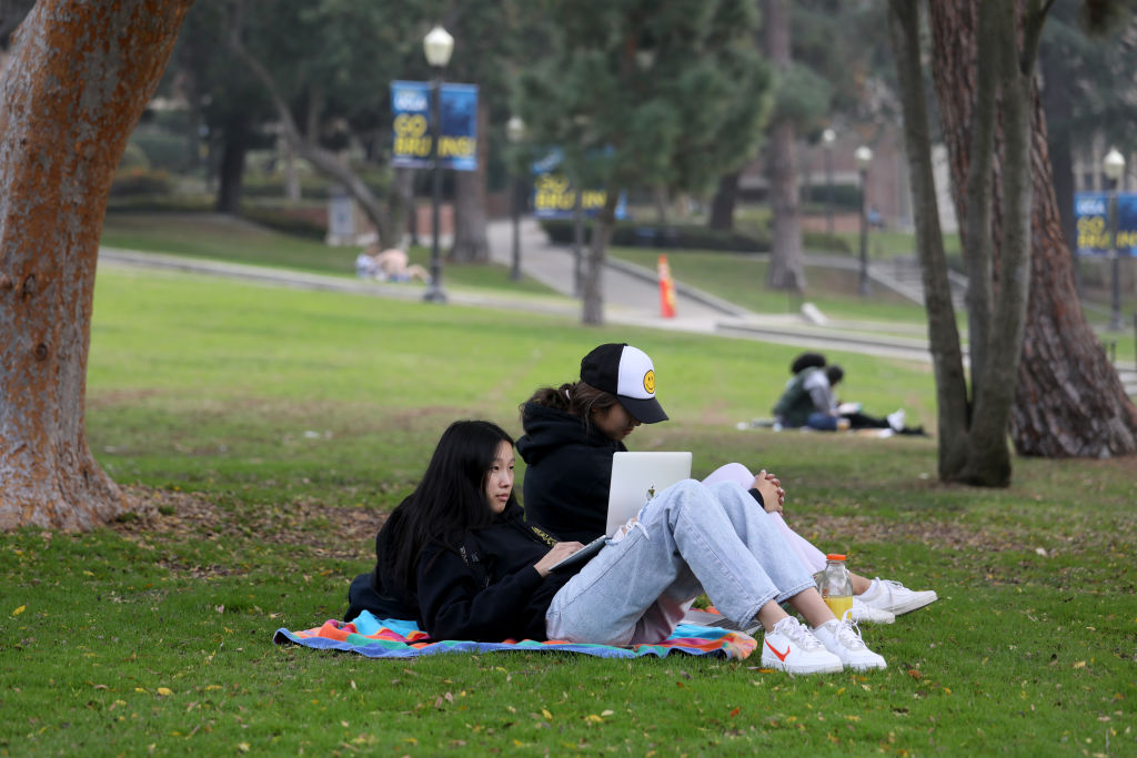 University California officials announce extension of remote instruction on five campuses, say high positivity rates call for extra precautions.