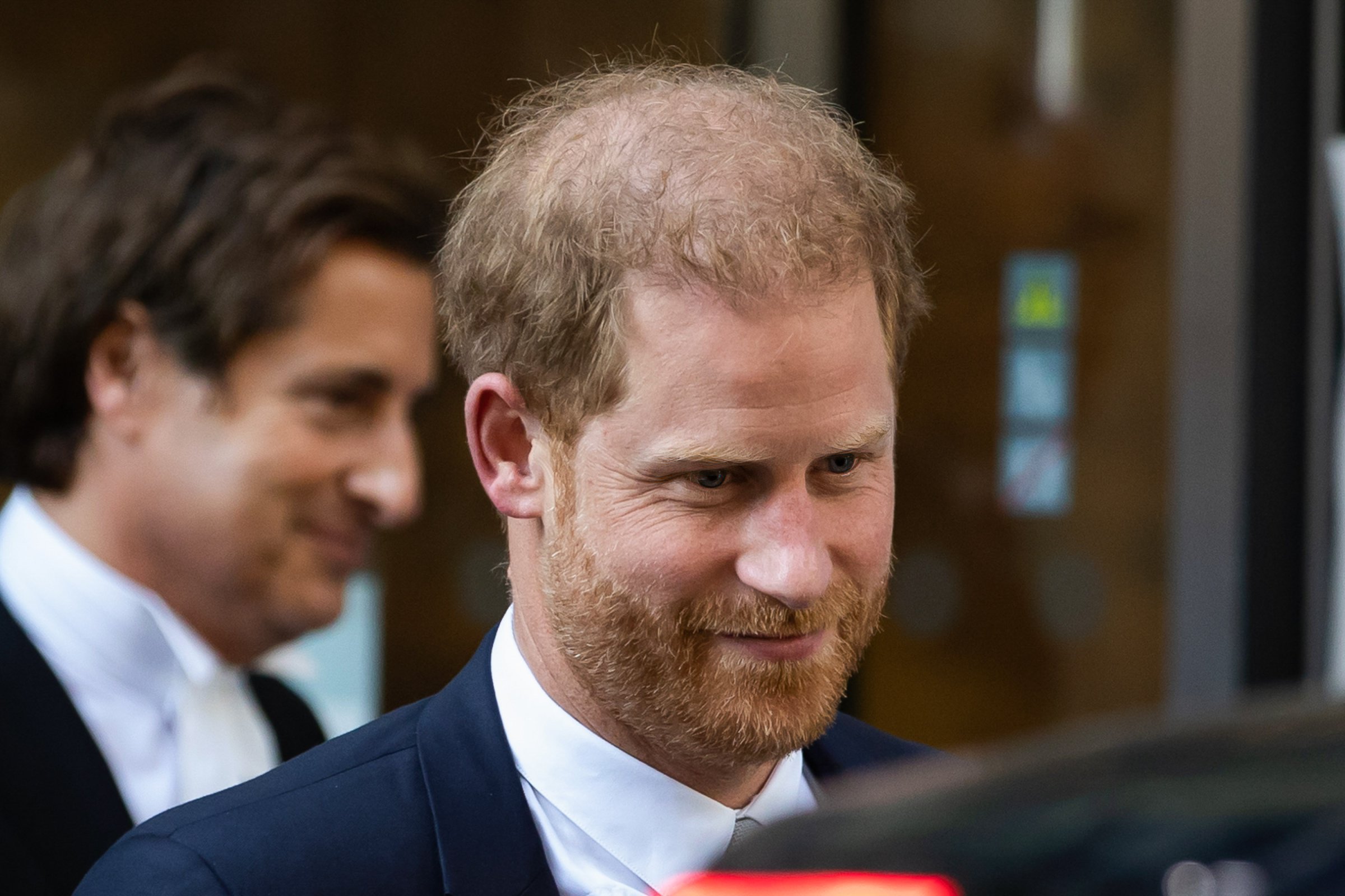 Prince Harry, Duke of Sussex leaves the Rolls Building at
