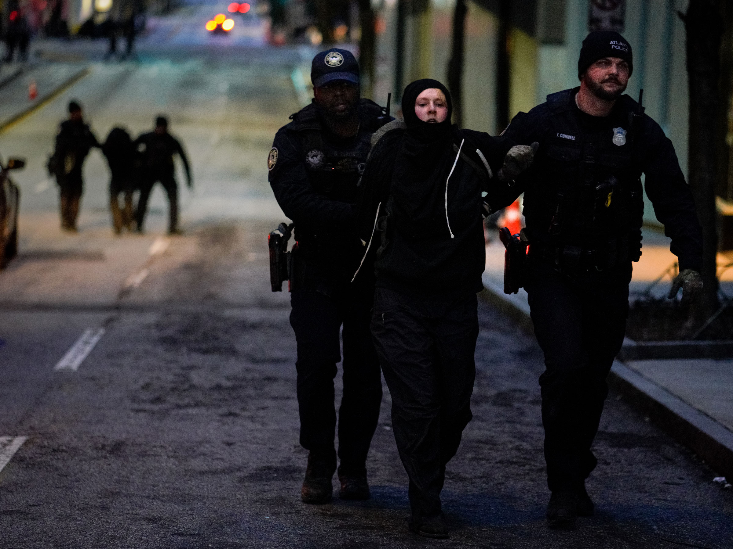 Police arrest a protestor during a “Stop Cop City” protest in Atlanta, Ga., on Jan. 21, 2023. (Benjamin Hendren—Anadolu Agency/Getty Images)