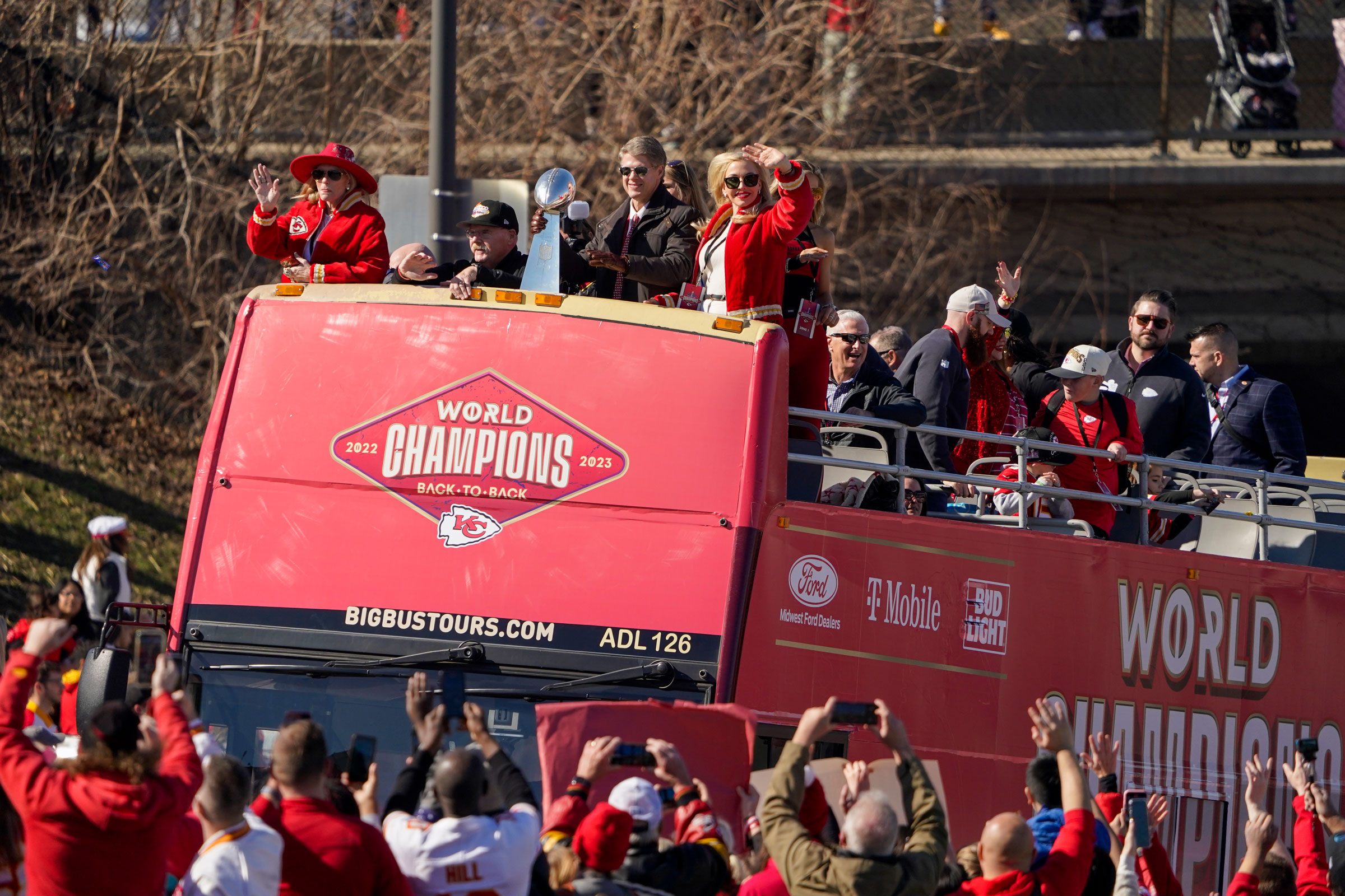 The Kansas City Chiefs owner Clark Hunt and coach Andy Reid celebrate during the Super Bowl victory parade.