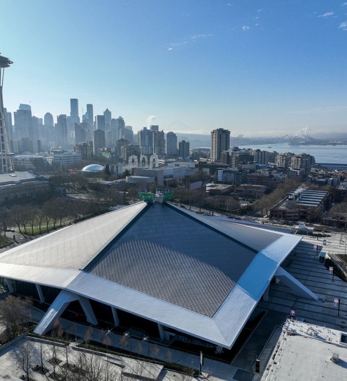 An aerial view of Climate Pledge Arena and the Space Needle on March 22, 2023 in Seattle, Washington.
