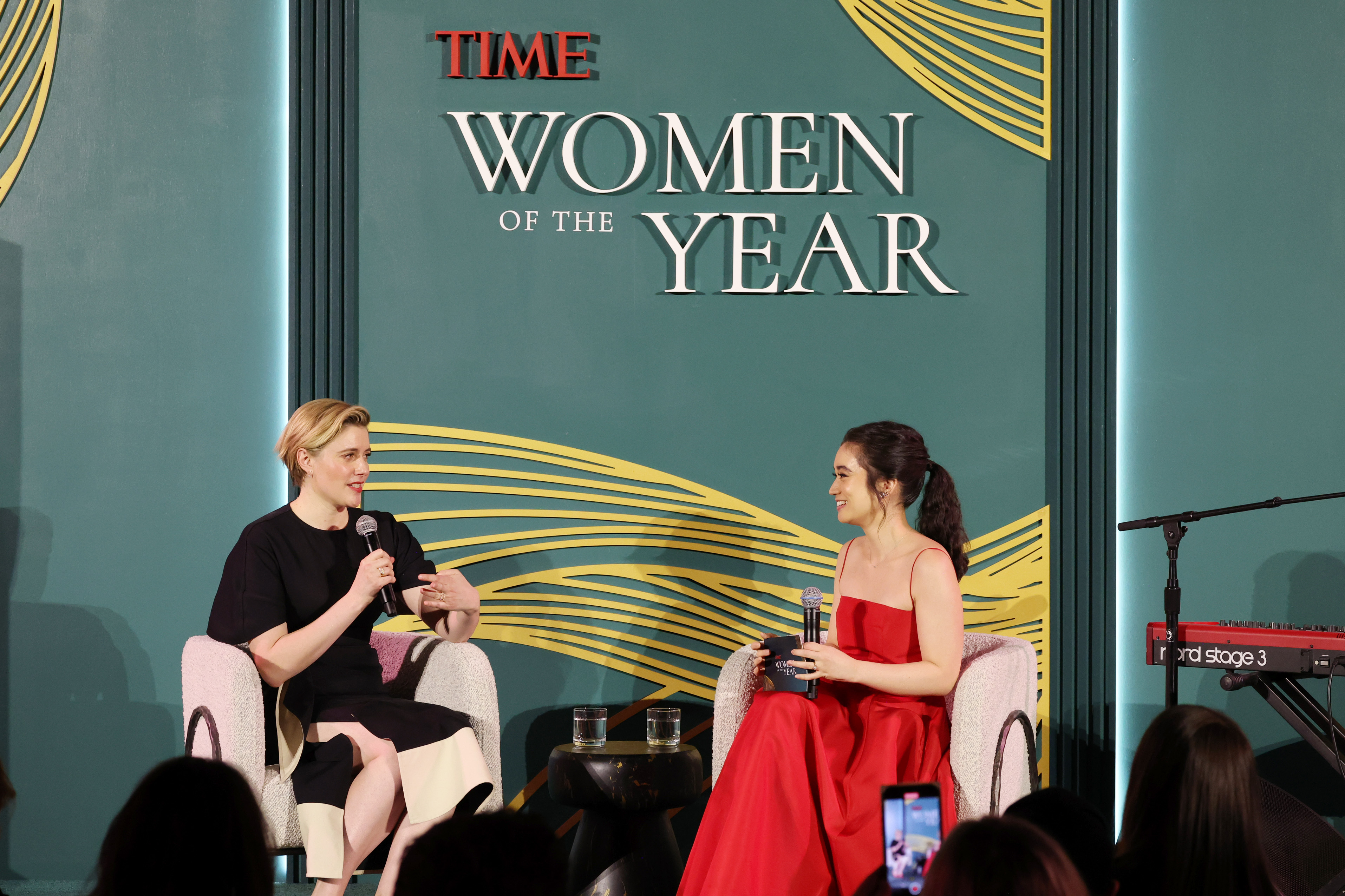 Greta Gerwig and TIME senior editor Lucy Feldman converse during TIME Women of the Year 2024. (Kevin Mazur—Getty Images for TIME)