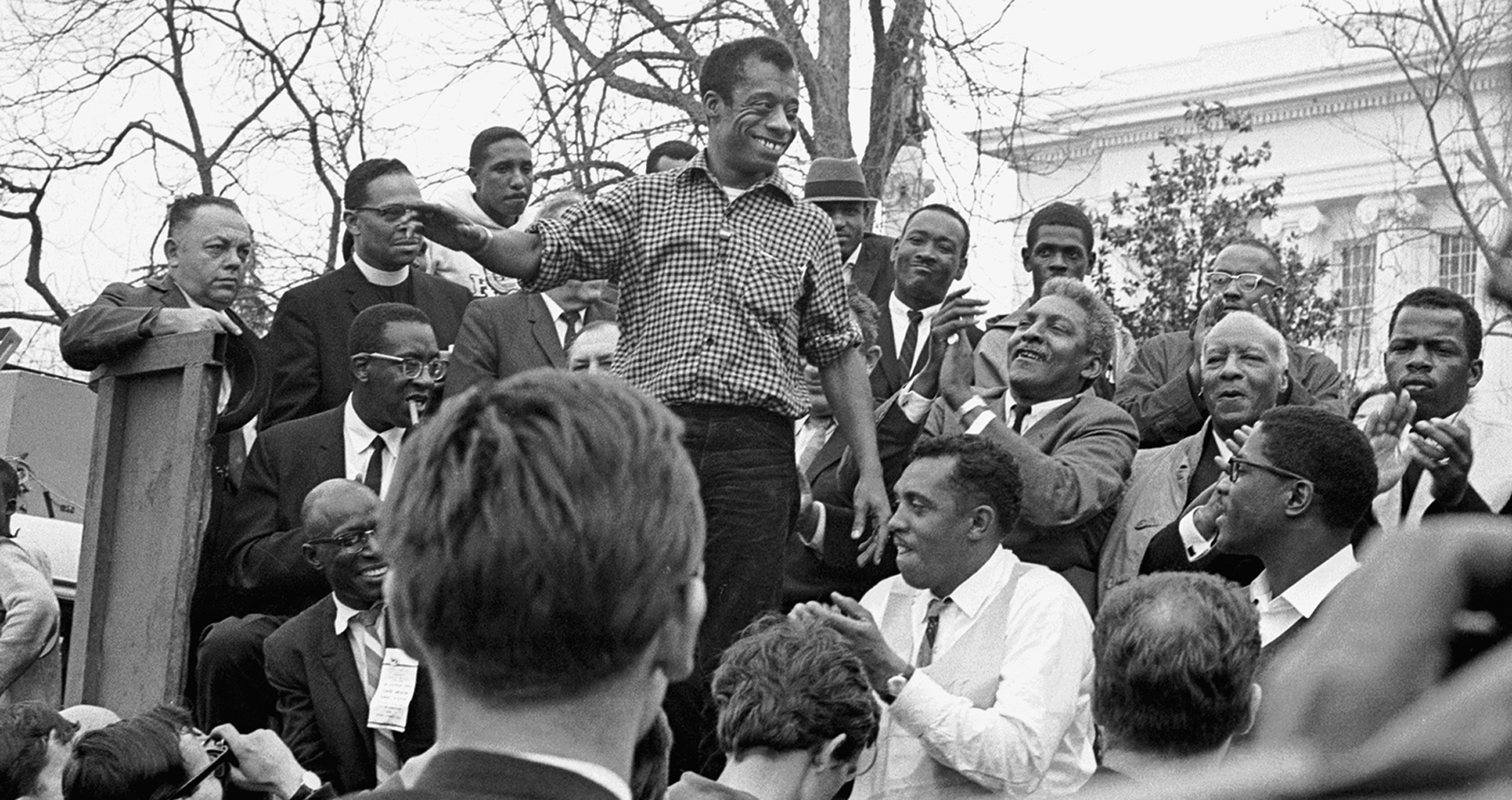 James Baldwin smiles while addressing a crowd participating in the march from Selma to Montgomery in support of voting rights, Alabama, March 1965.