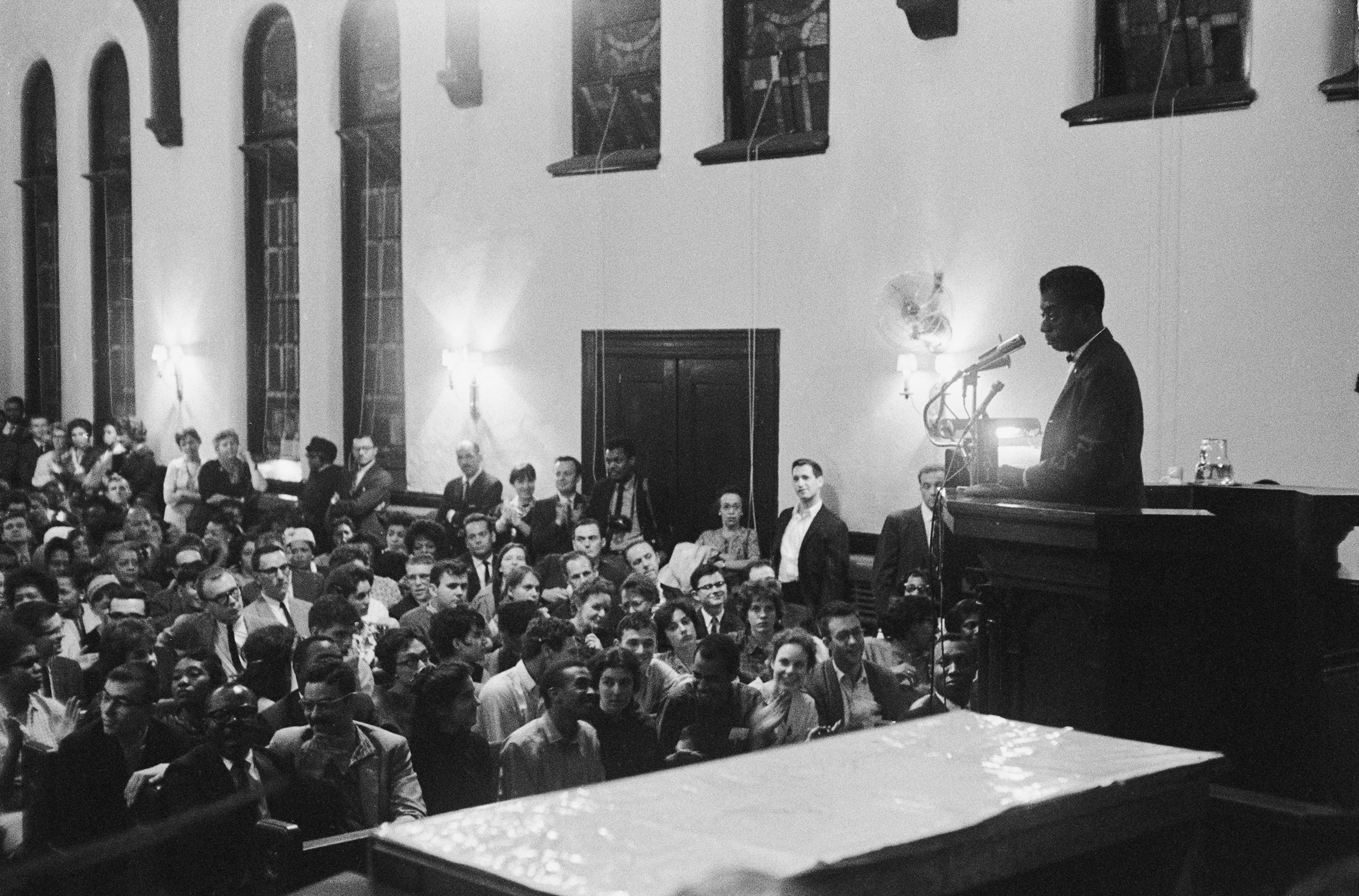 James Baldwin addresses an audience in a church, Oct. 1963.