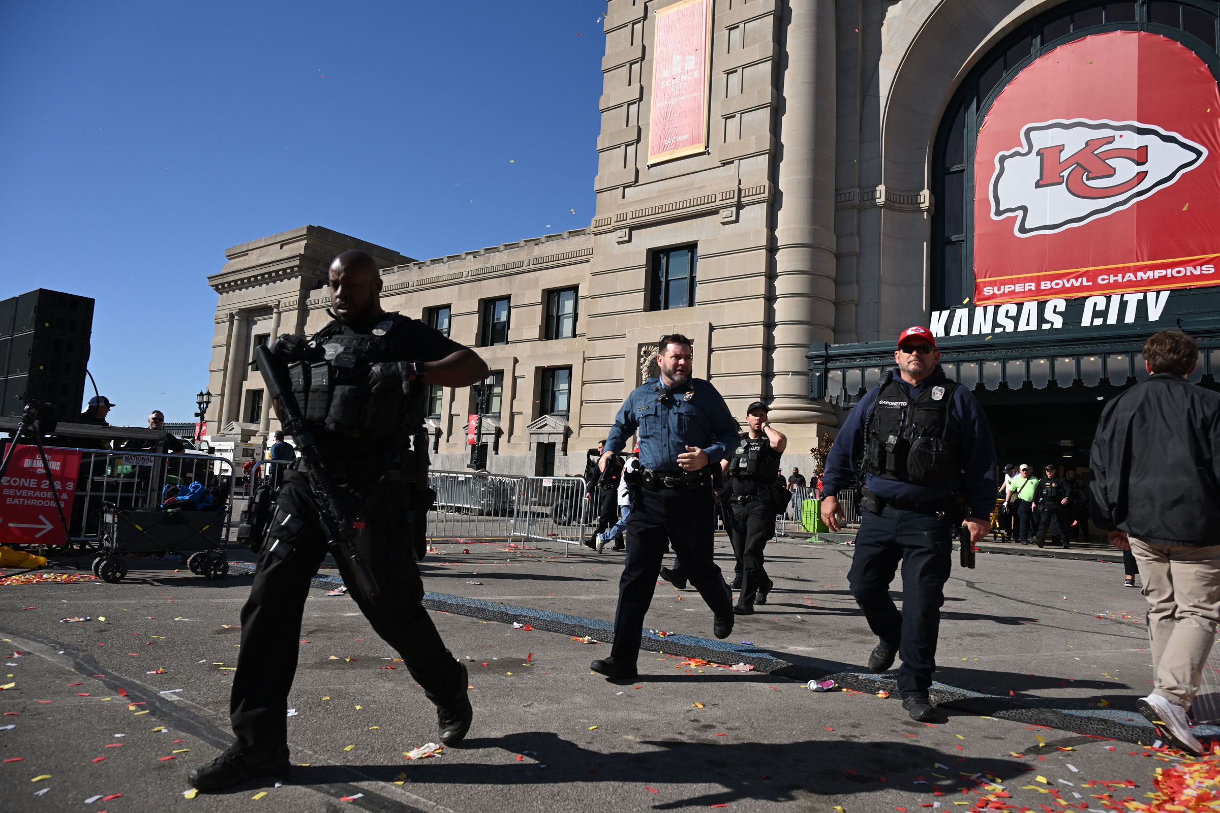 Police respond after shots were fired near the Kansas City Chiefs' Super Bowl LVIII victory parade in Kansas City, Mo., on Feb. 14, 2024.