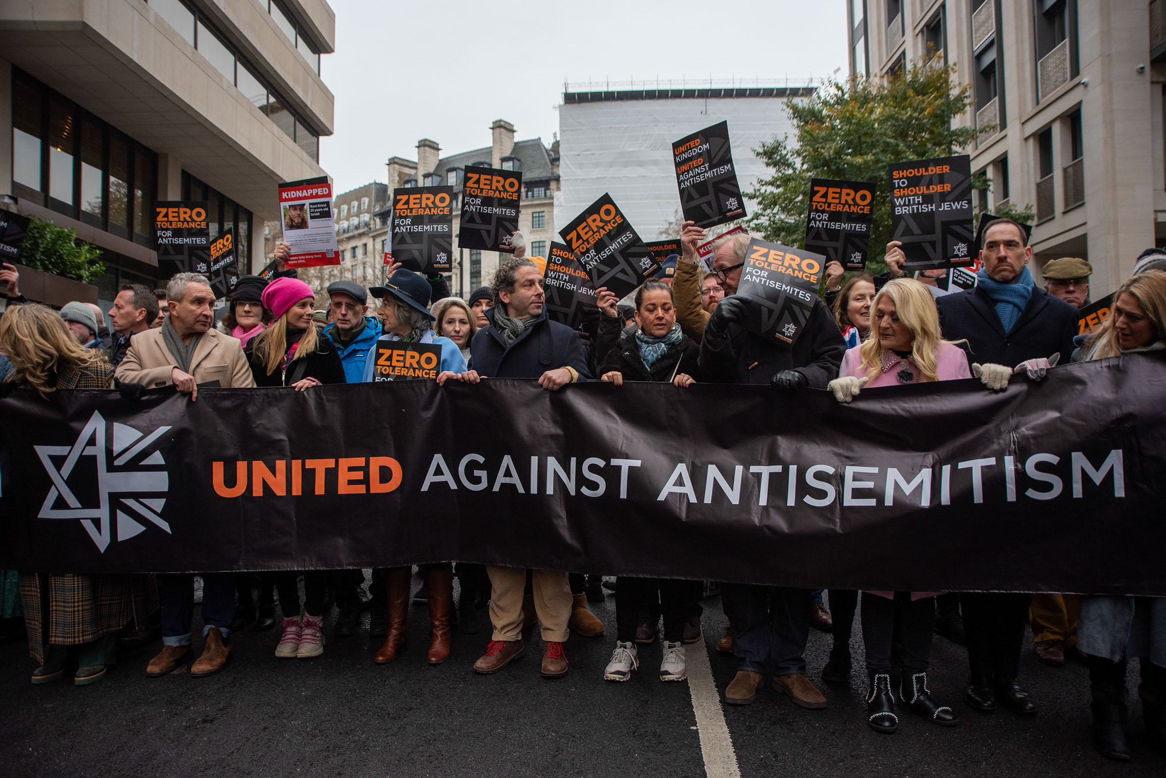 Protesters march through central London to Parliament Square at a demonstration against antisemitism.