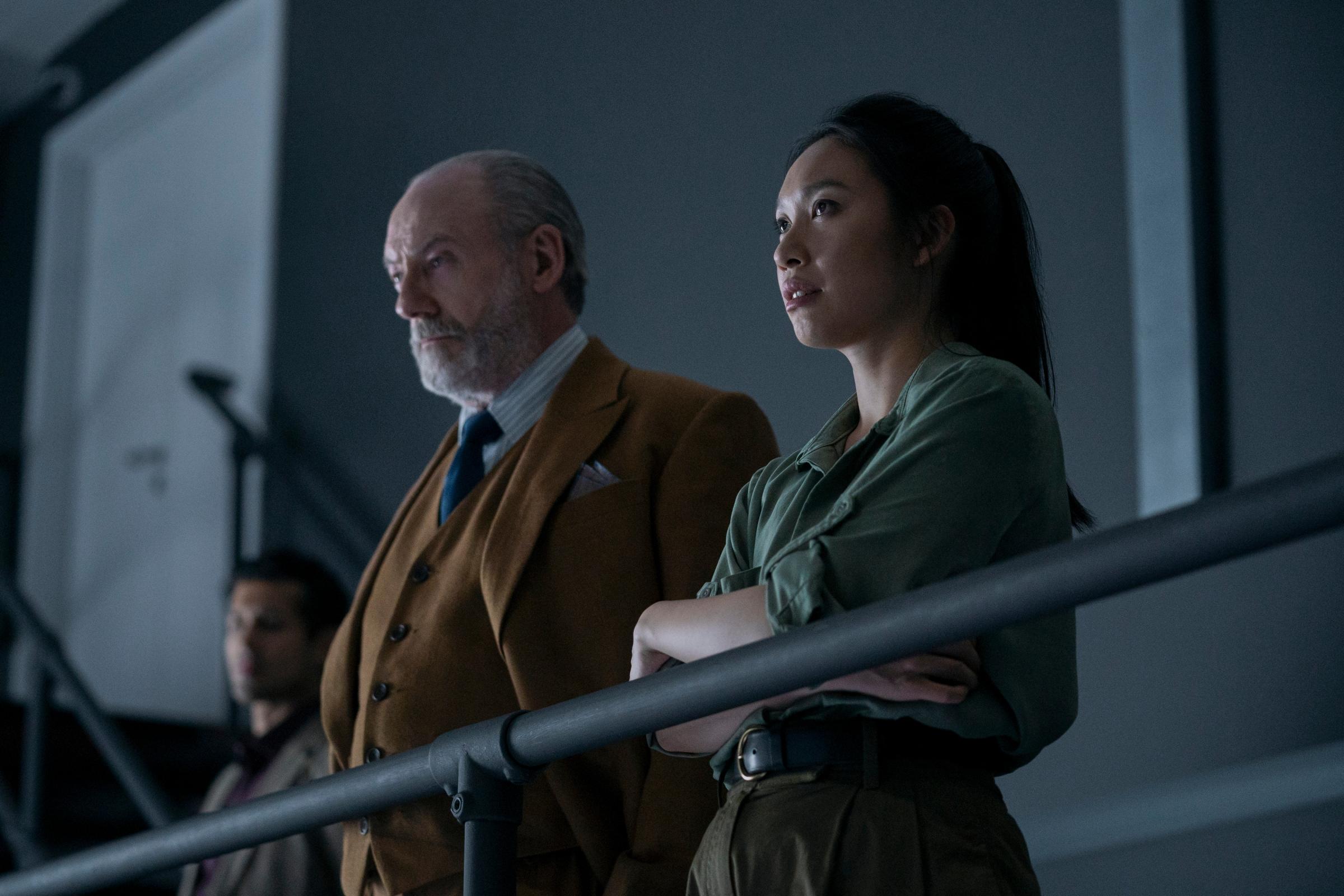 Liam Cunningham as Wade and Jess Hong as Jin in episode 8 of 3 Body Problem.
