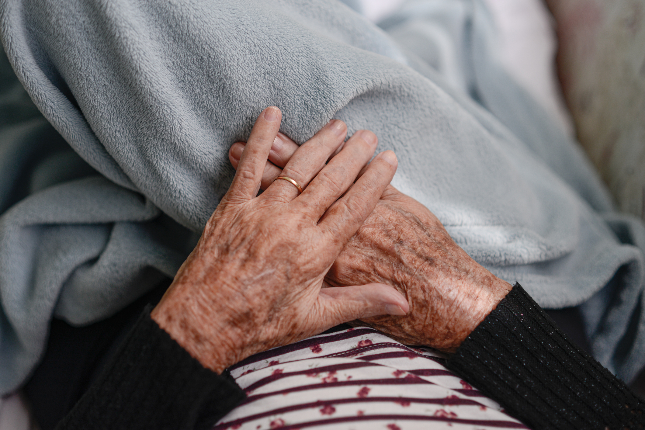 Hands of an elderly woman resting