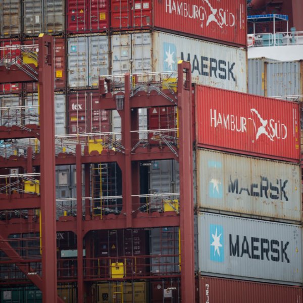 Containers are stacked on a container ship in the port of Hamburg.