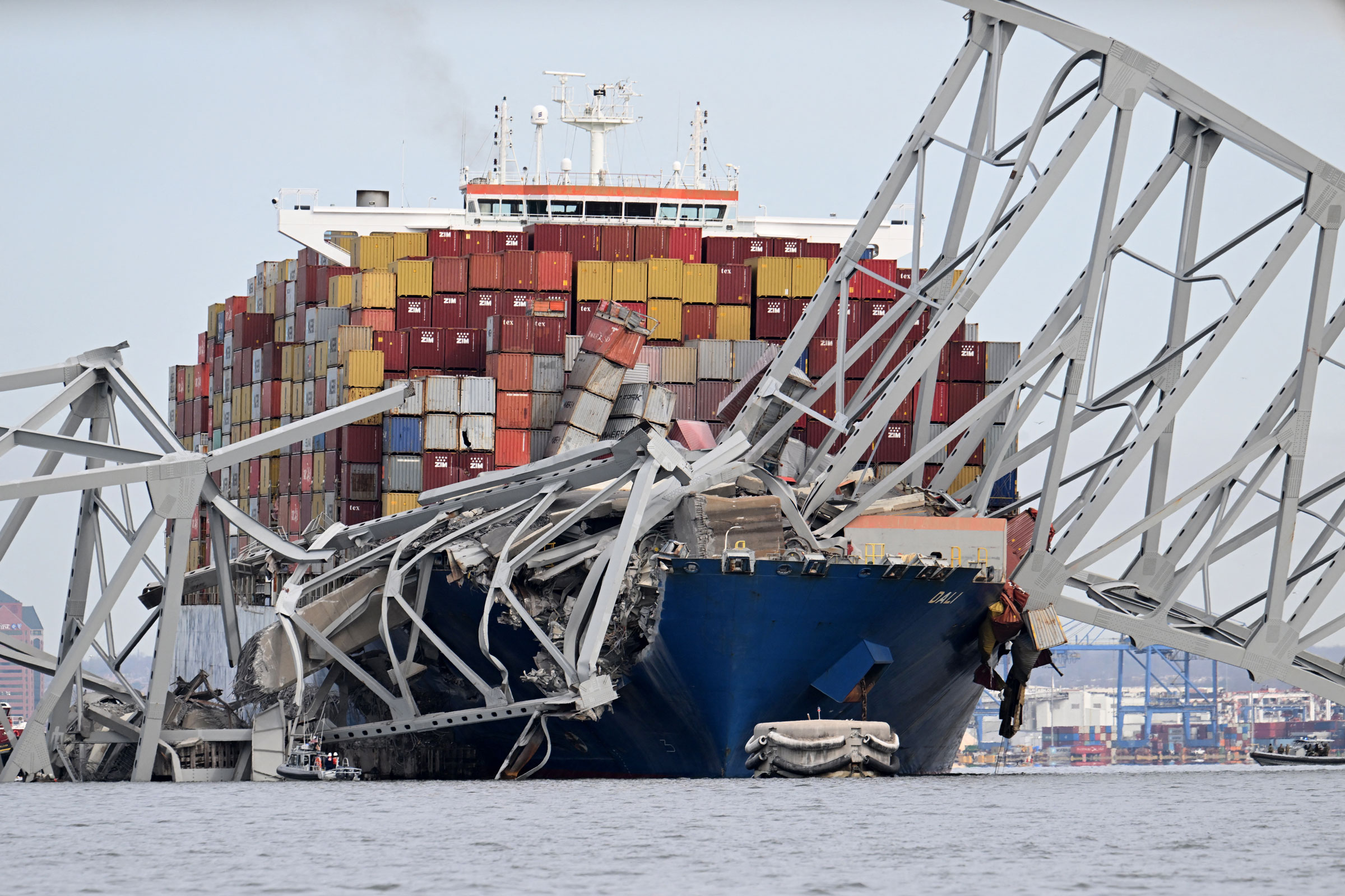 The steel frame of the Francis Scott Key Bridge sits on top of the container ship Dali after the bridge collapsed, in Baltimore, on March 26, 2024.