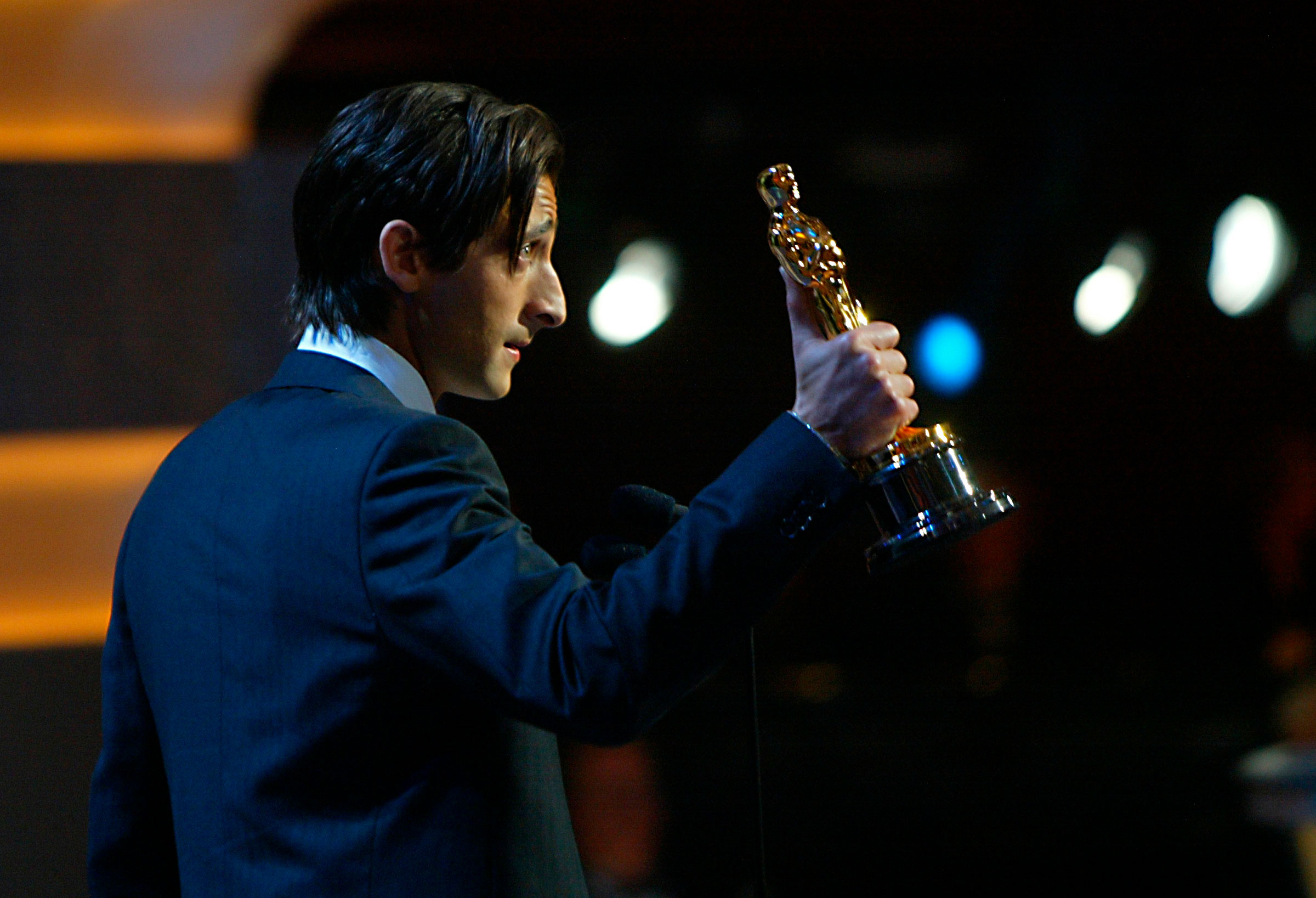 Adrien Brody accepts the Oscar for Best Actor for The Pianist, at the 75th Annual Academy Awards on March 23, 2003.