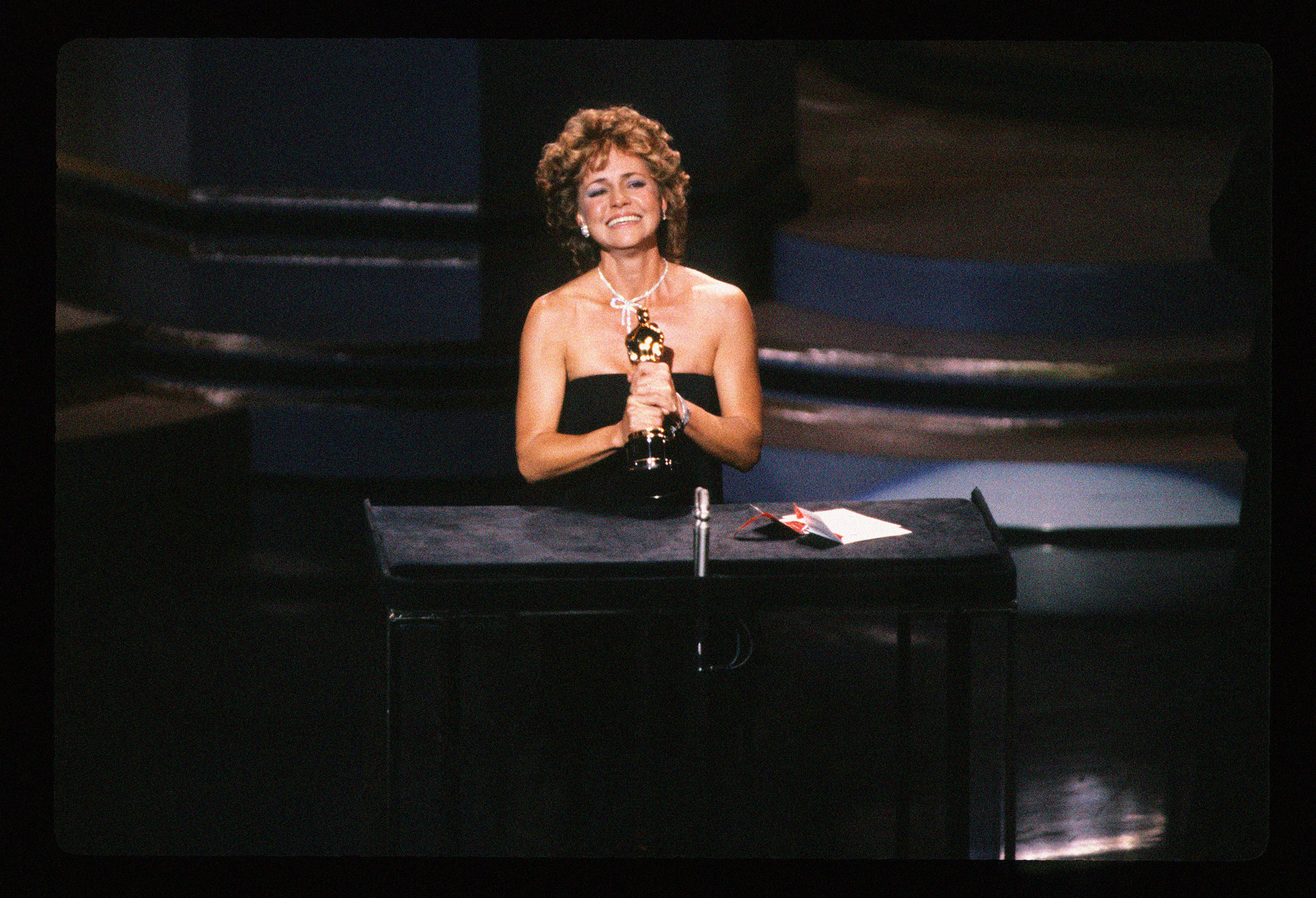 Sally Field accepts the Oscar for Best Actress for her role in the film Places in the Heart at the 57th Academy Awards on March 25, 1985.