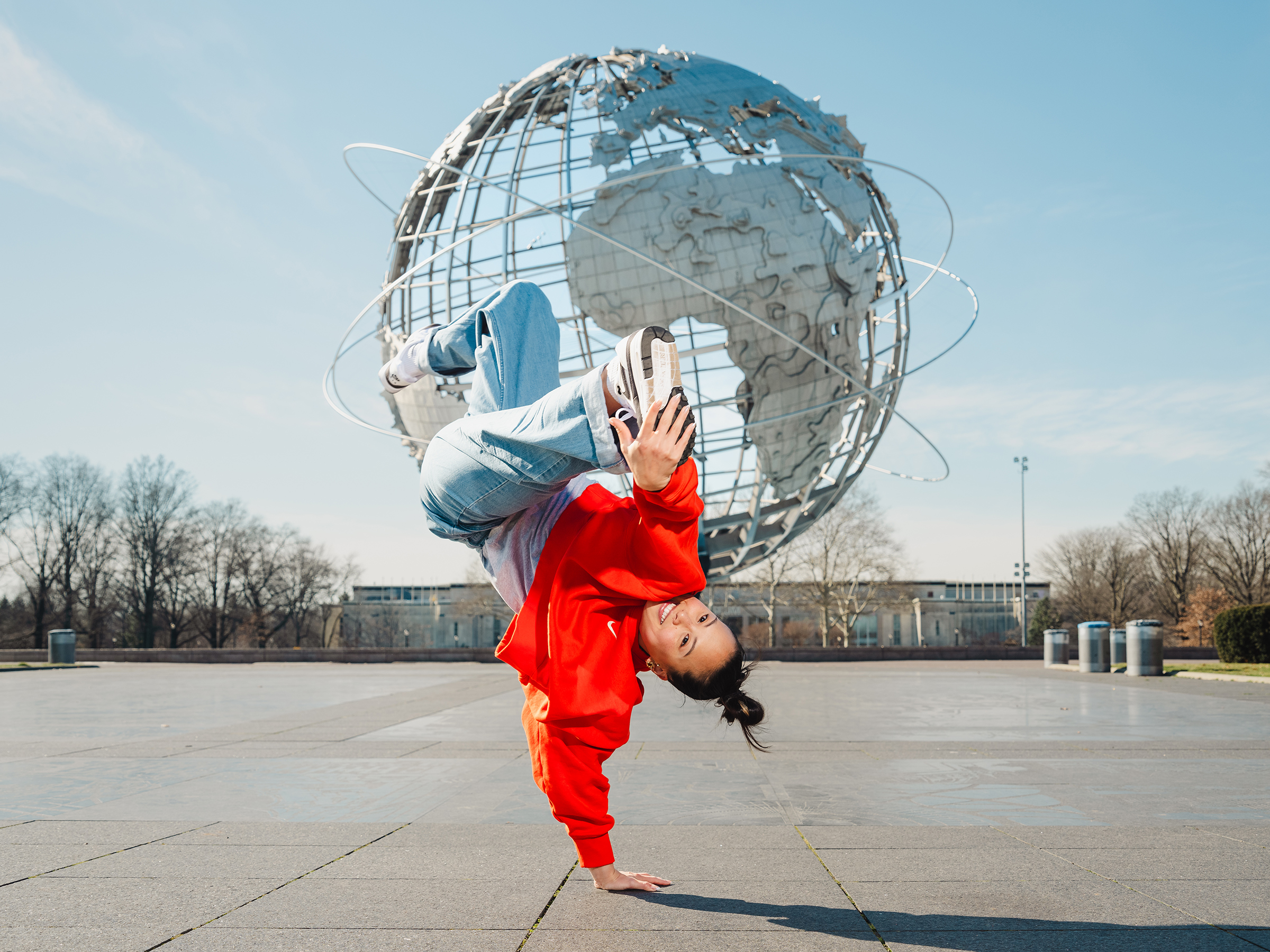 Choi shows off a move near the Unisphere at Flushing Meadows Corona Park in New York City. “Breakers used to break back in the day under the globe,” she says