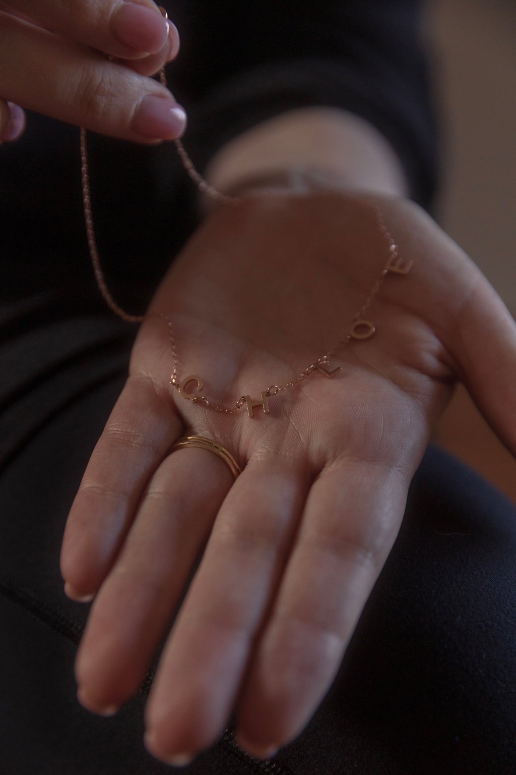Before terminating the pregnancy, Kate and Justin named the baby Chloe. Kate was gifted this necklace by a friend after she had the abortion.