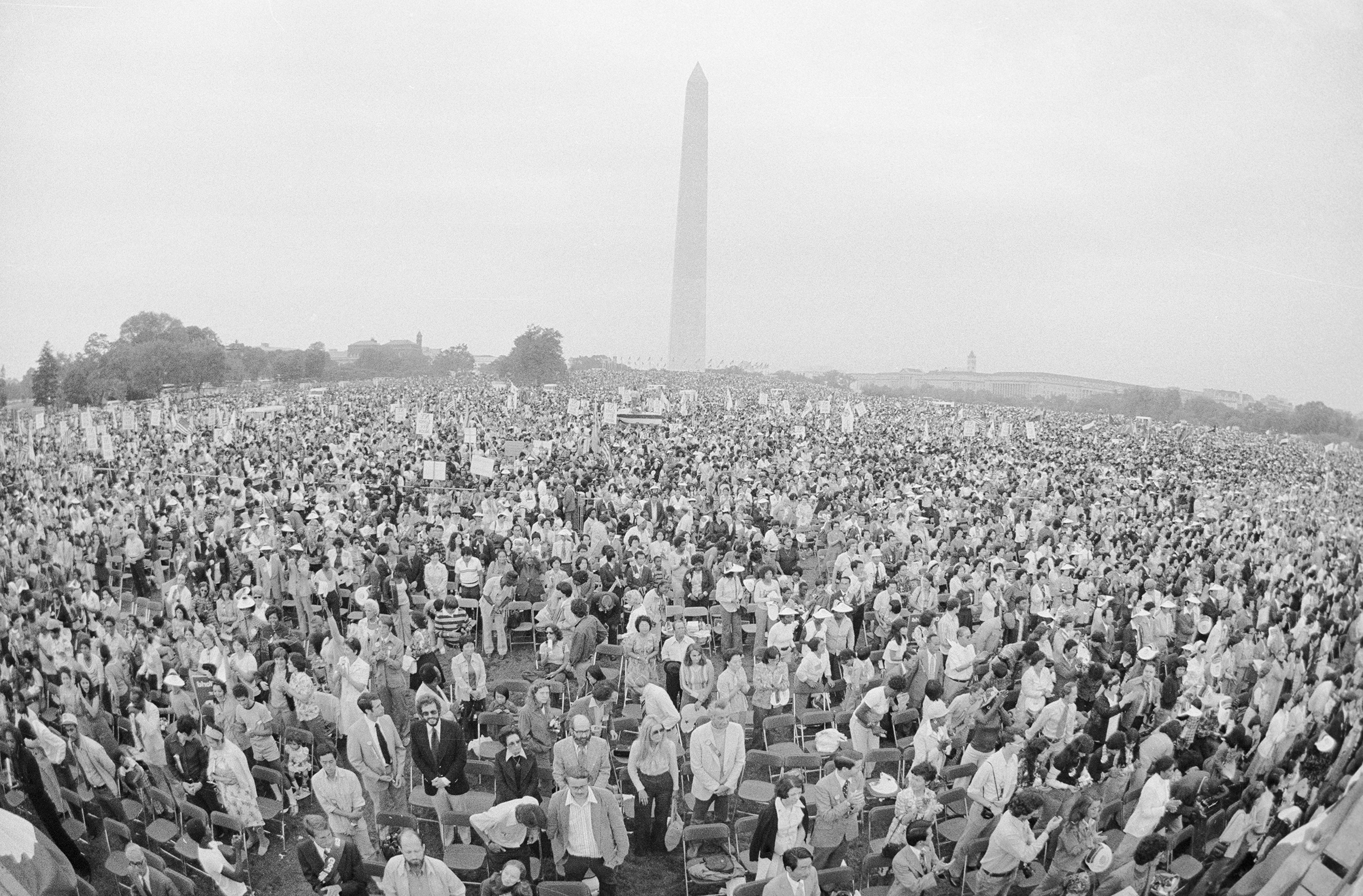 Crowds gather on the Washington Monument Grounds for a "God Bless America Festival" sponsored by Reverend Sun Myung Moon, the Korean evangelist, and his Unification Church on Sept. 18, 1976.