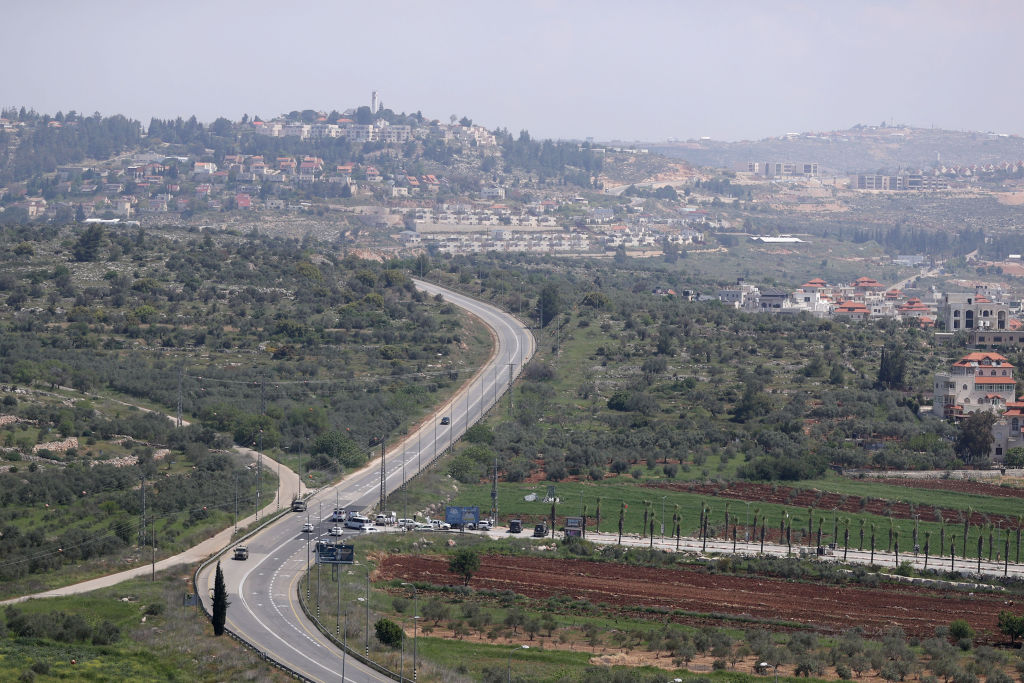 Israeli forces closed two towns in the West Bank to entry and exit