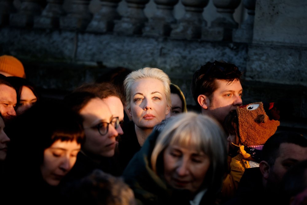 Navalnaya and many other people queue outside the Russian embassy to cast their vote in the presidential election on March 17.