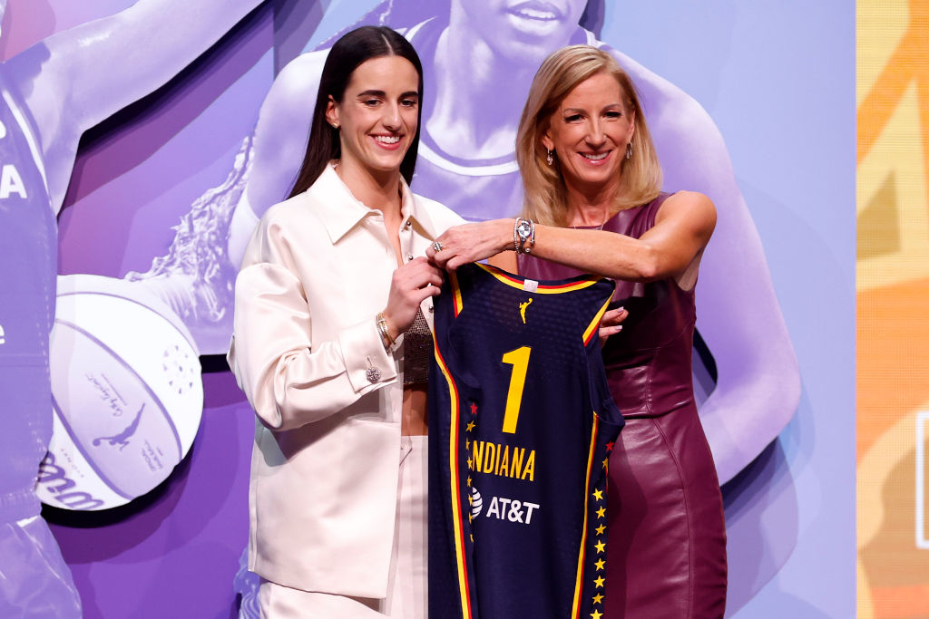 Caitlin Clark poses with WNBA Commissioner Cathy Engelbert after being selected first overall pick by the Indiana Fever during the 2024 WNBA Draft at Brooklyn Academy of Music on April 15, 2024 in New York City.