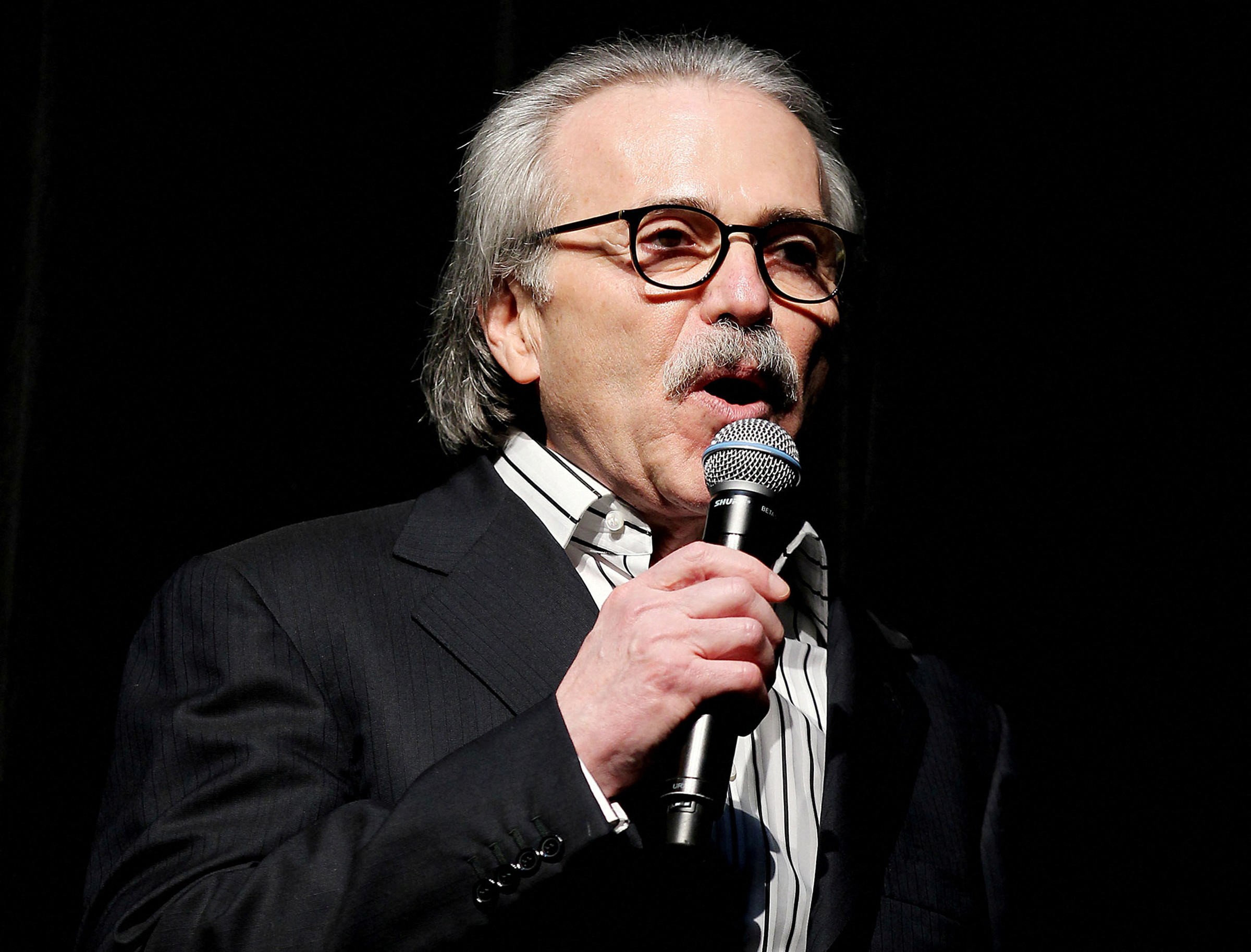 David Pecker, chair and CEO of American Media, speaks at the Shape and Men's Fitness Super Bowl Party in New York City, Jan. 31, 2014.