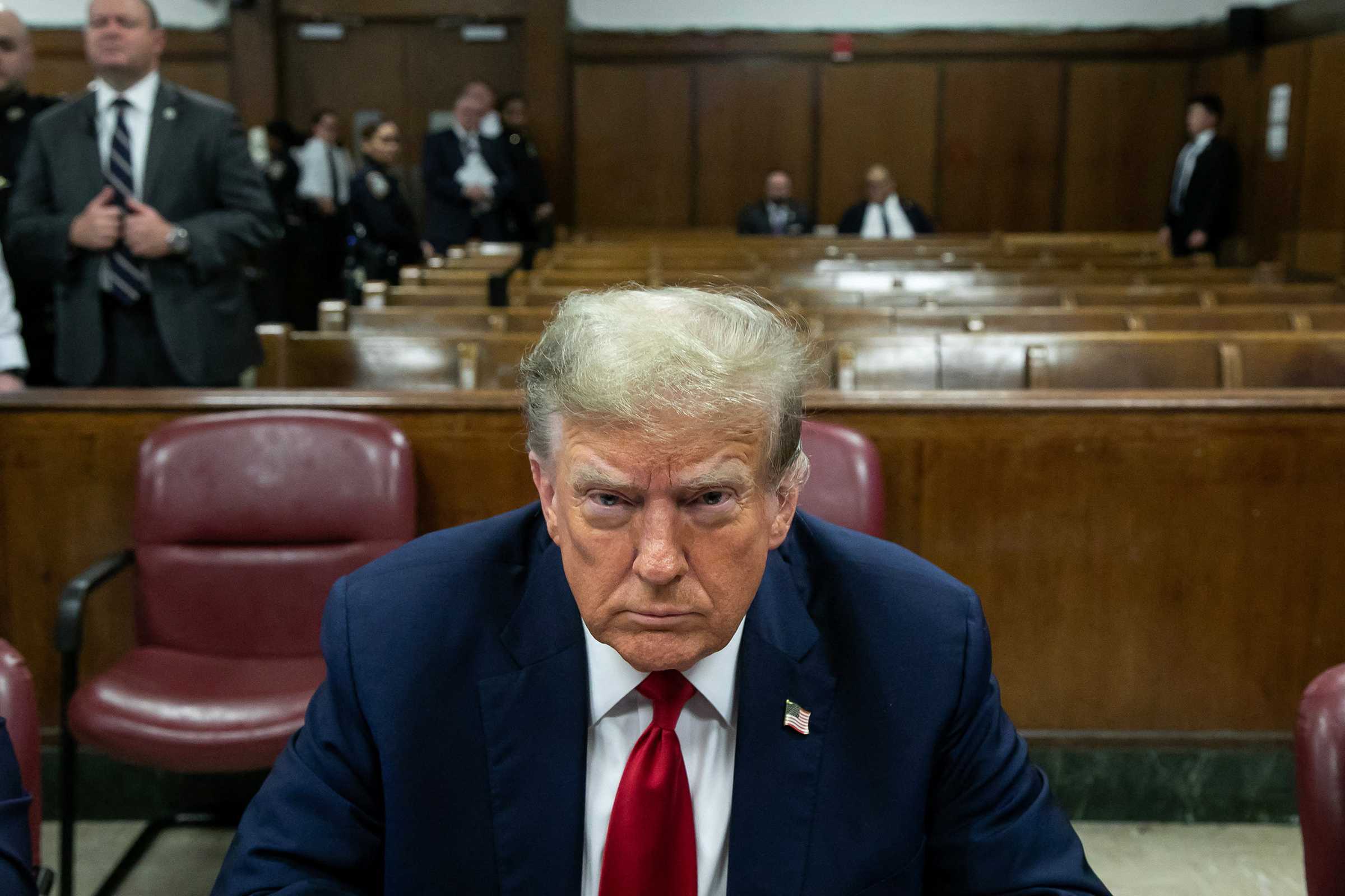 Former U.S. President Donald Trump attends the first day of his trial for allegedly covering up hush money payments linked to extramarital affairs, at Manhattan Criminal Court in New York City on April 15, 2024.