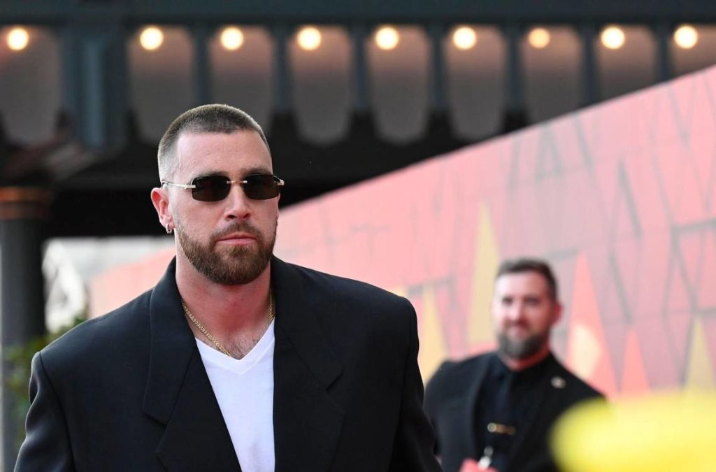 Kansas City Chiefs tight end Travis Kelce walks the red carpet at Union Station for the Super Bowl LVII championship ring ceremony in June 2023.