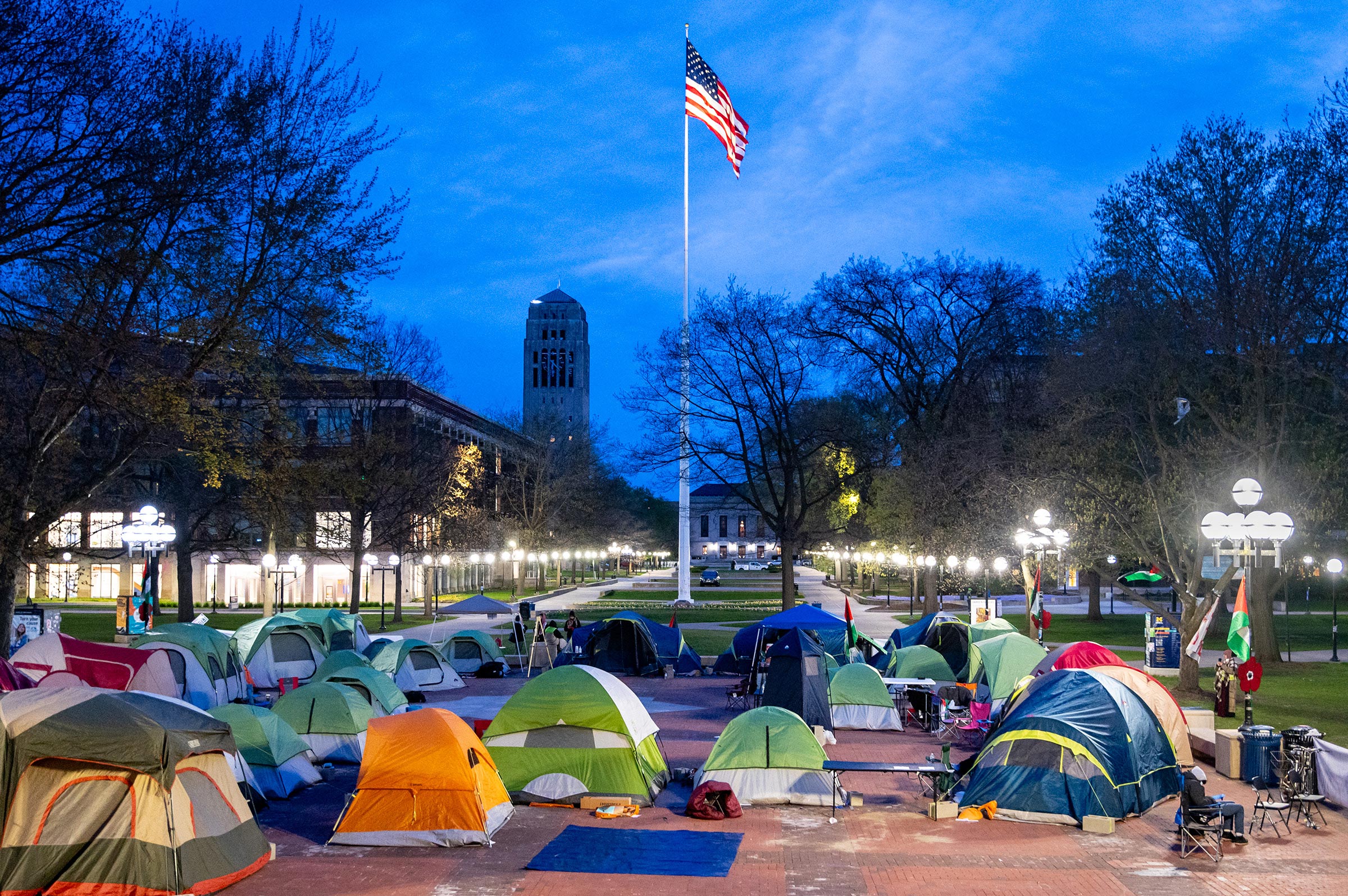 A deep blue sky over several tents set up over the University of Michigan's Central Campus early in the morning on April 23.
