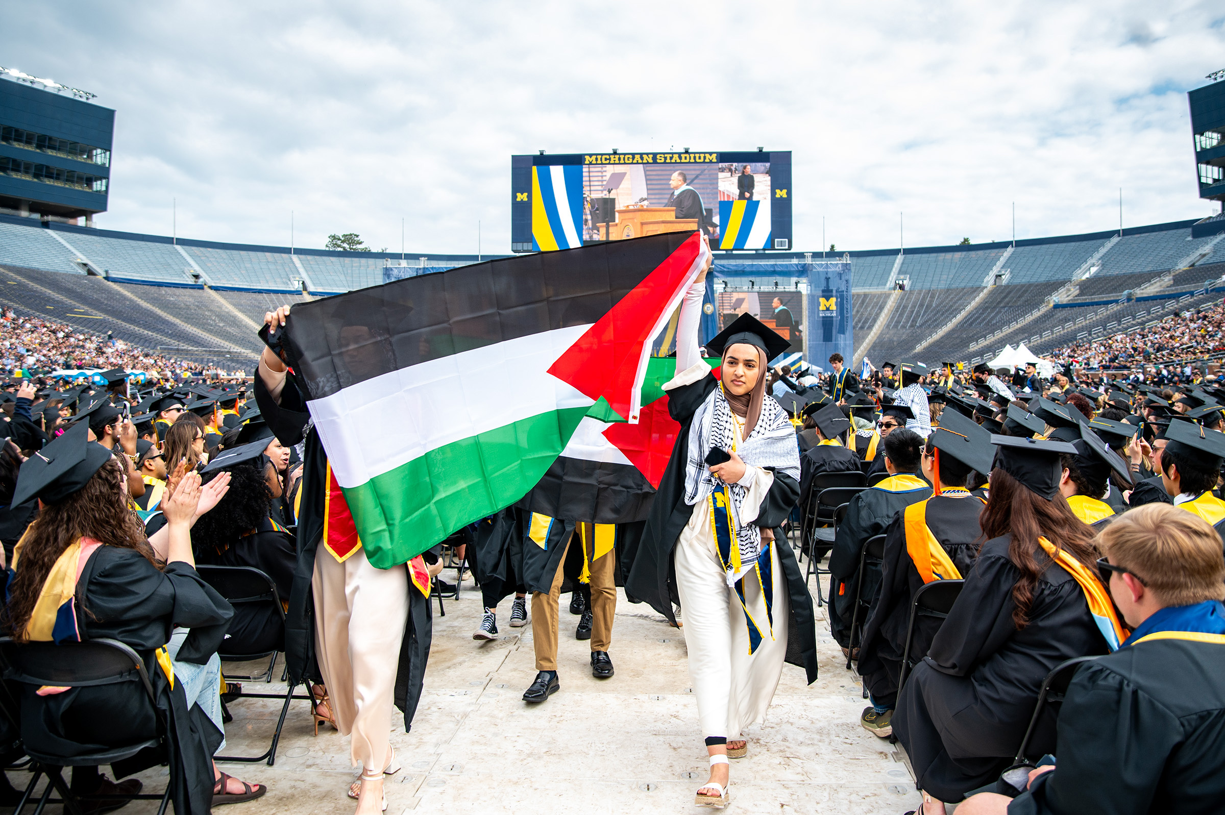 Salma Hamamy, co-president of Students Allied for Freedom and Equality (SAFE), and other pro-Palestinian graduating students protest at the University of Michigan 2024 Spring Commencement on May 4.