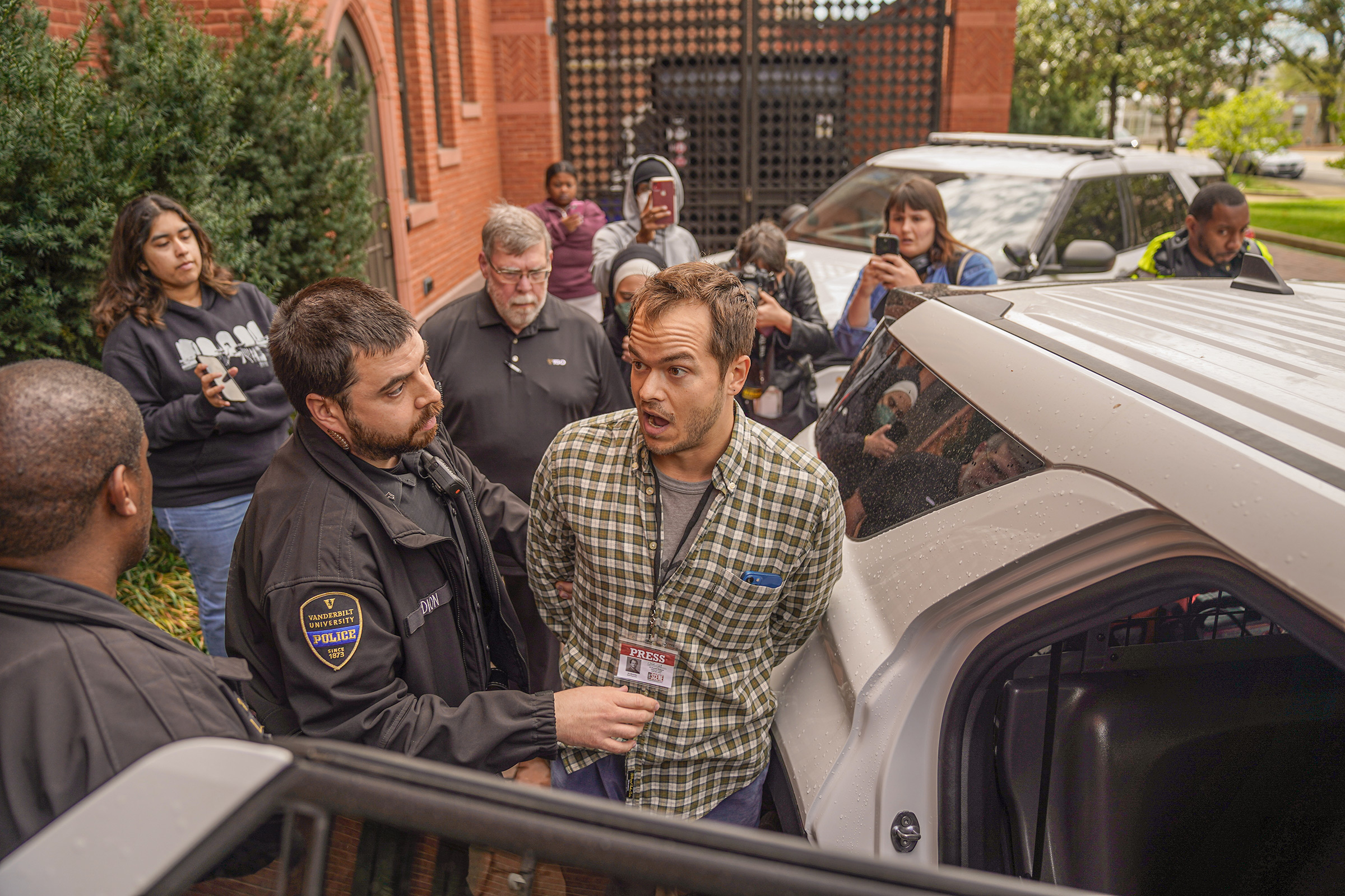 Eli Motycka, a Nashville Scene reporter, is arrested by Vanderbilt University police near Kirkland Hall on March 26.