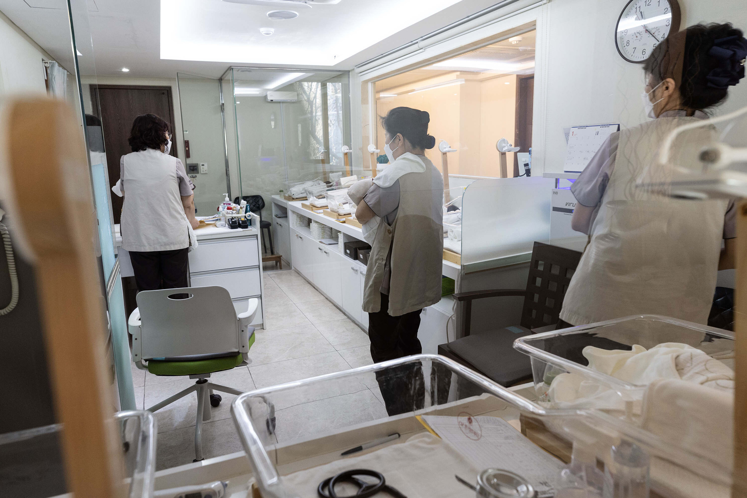 Staff take care of newborns at St. Park, a postpartum care center, or joriwon, in Seoul, South Korea, Jan. 15, 2024. 